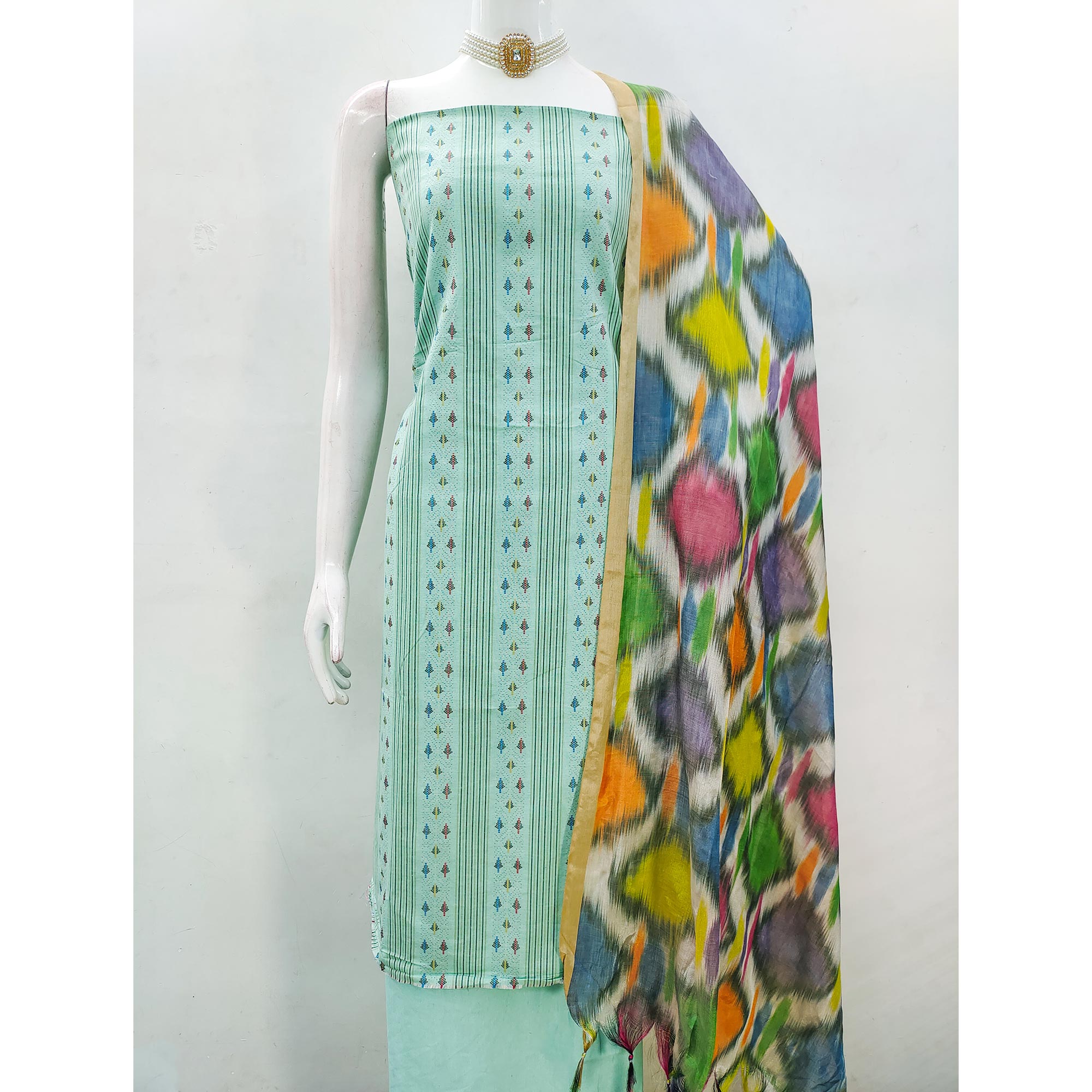 Make a Statement With Turquoise Woven Cotton Blend Dress Material