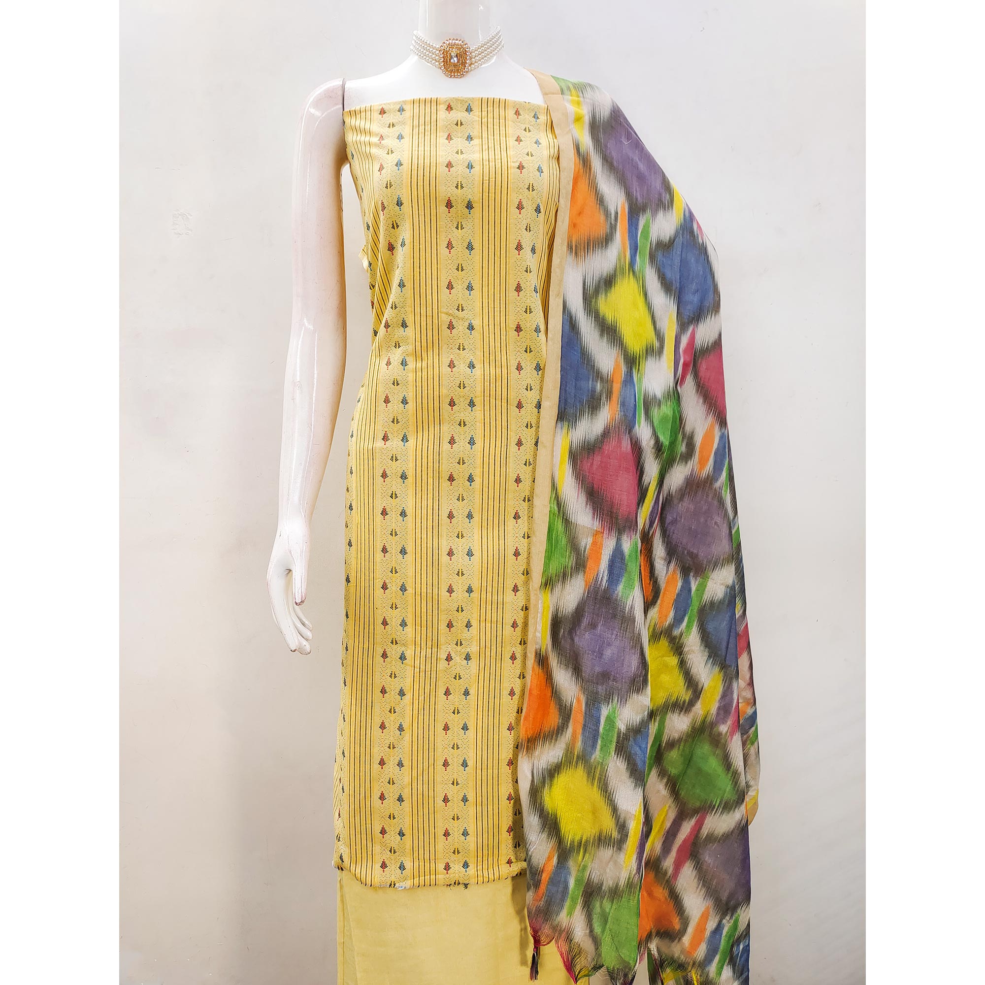 Unleash Your Style With This Yellow Woven Cotton Blend Dress Material