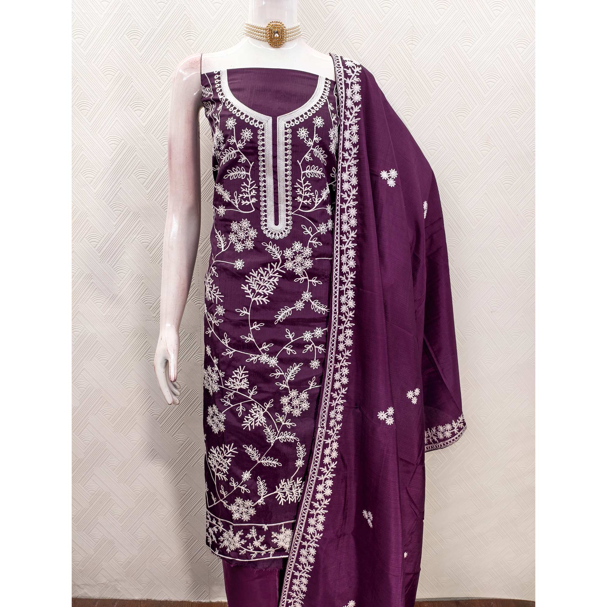 Purple Art Silk Dress Material Adorned With Floral Thread Embroidery Work