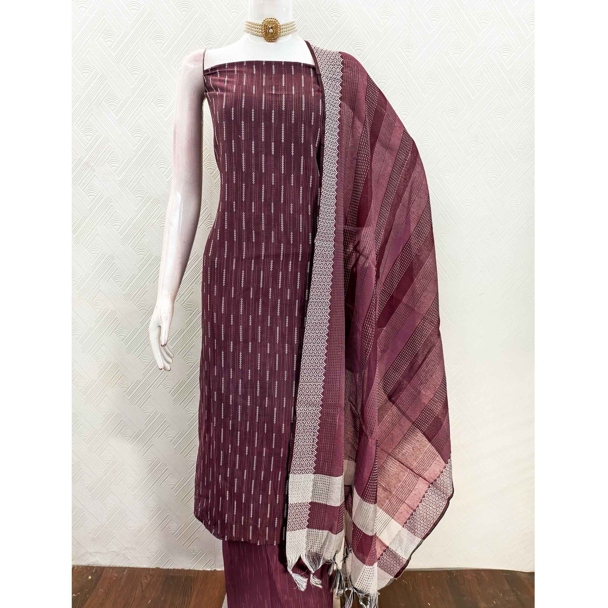 Wine Poly Cotton Blend Dress Material Adorned With Striped Weaving Work