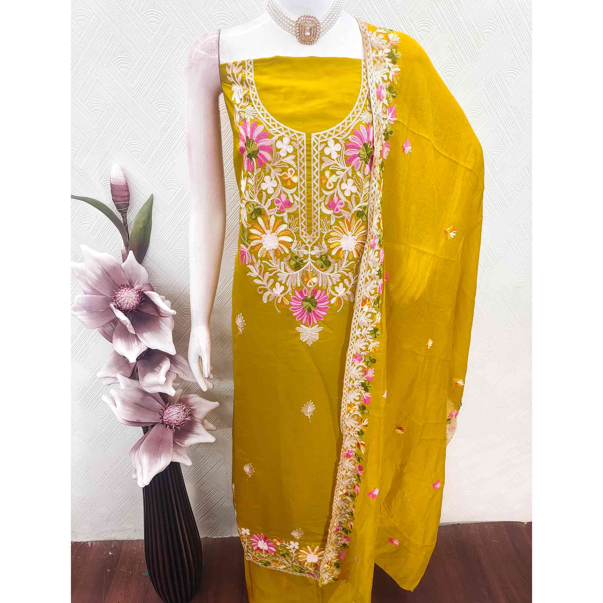 Mustard Designer Roman Art Silk Dress Material Adorned With Floral Thread Embroidery Work