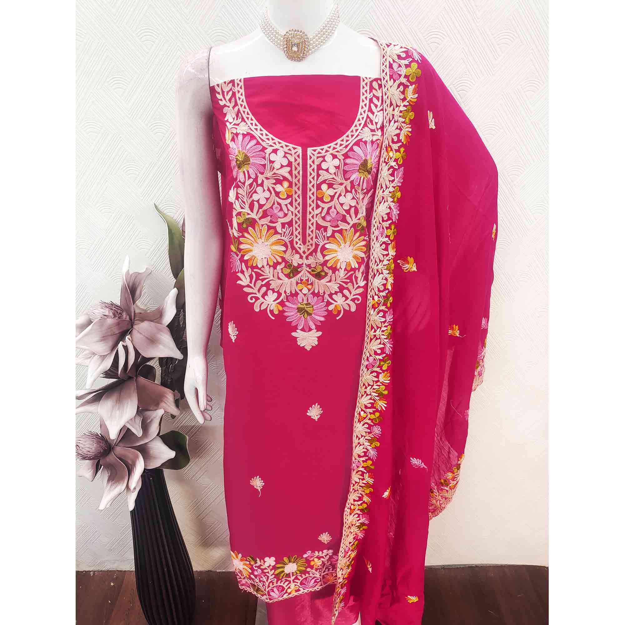 Rani Pink Designer Roman Art Silk Dress Material Adorned With Floral Thread Embroidery Work