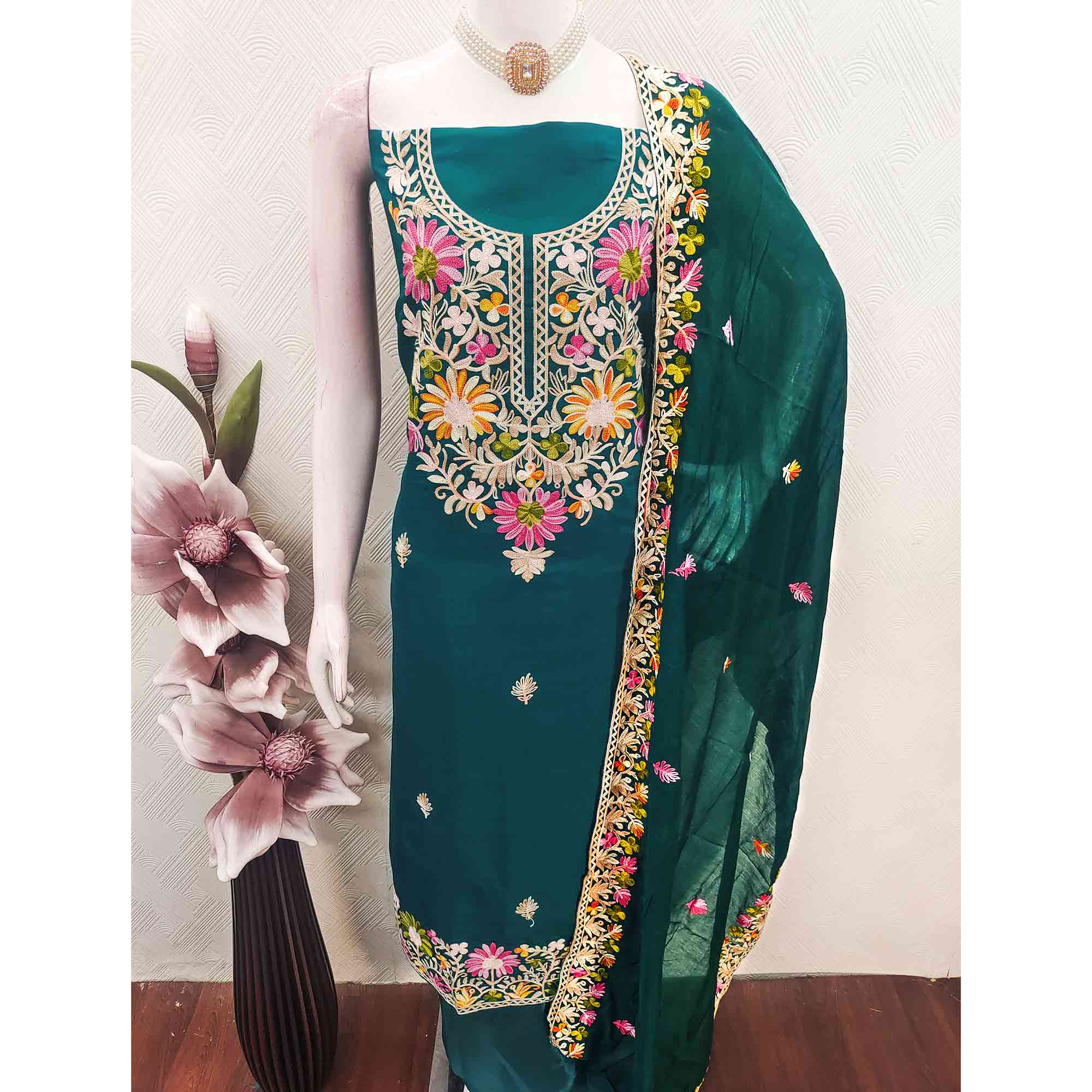Teal Designer Roman Art Silk Dress Material Adorned With Floral Thread Embroidery Work