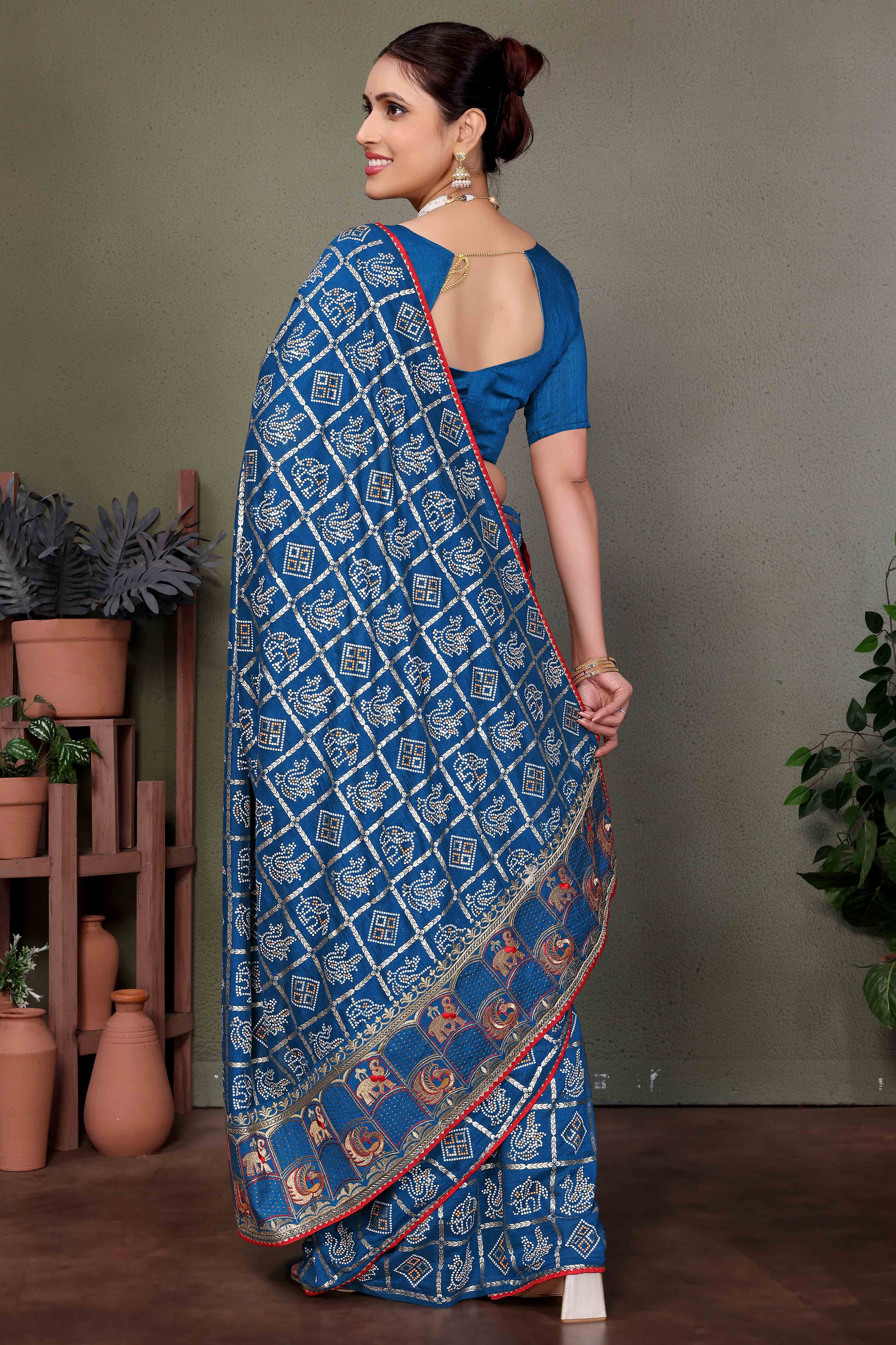 Blue Vichitra Silk Saree Featuring Bandhani Patterns and Graceful Embroidered Borders
