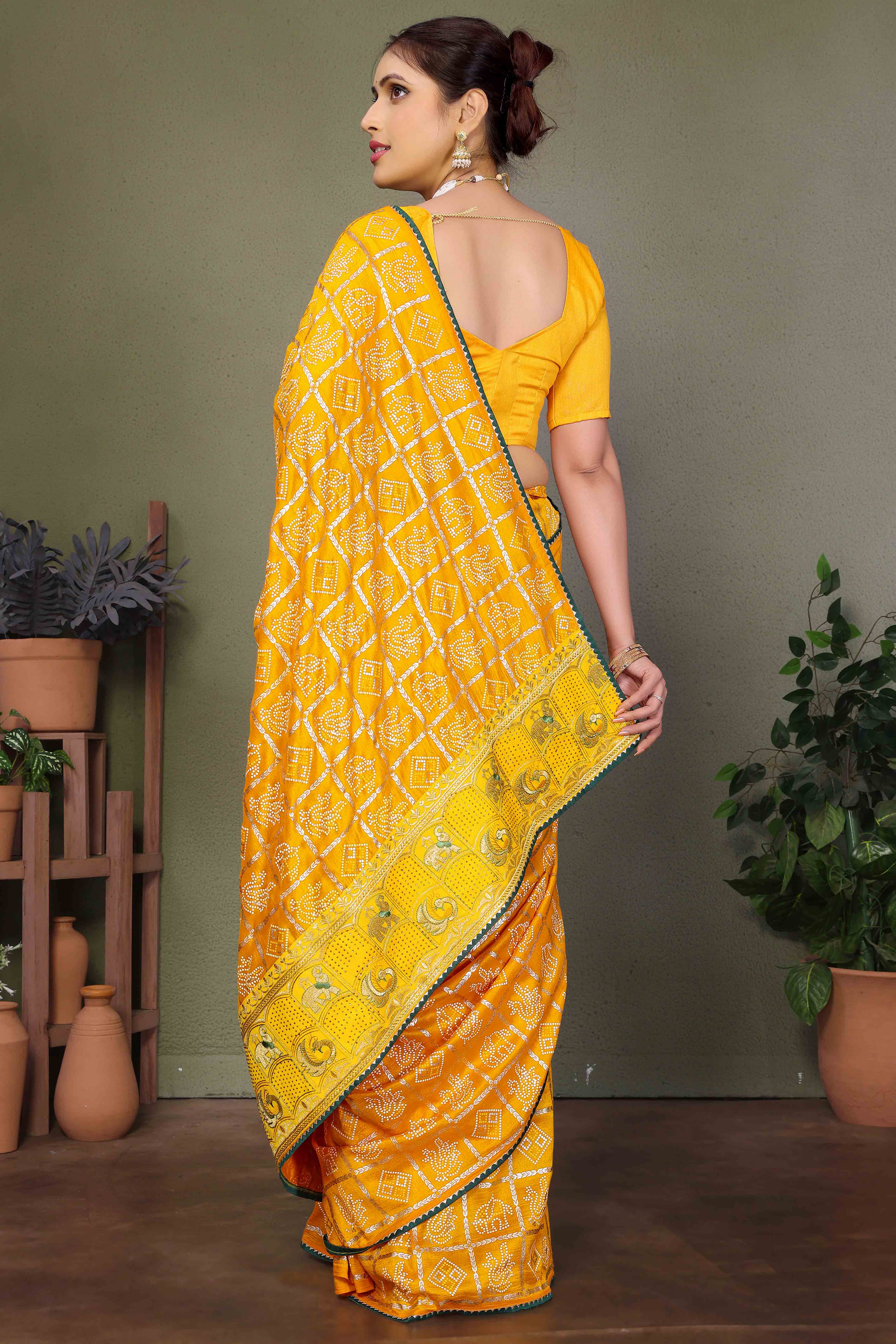 Yellow Vichitra Silk Saree Featuring Bandhani Patterns and Graceful Embroidered Borders
