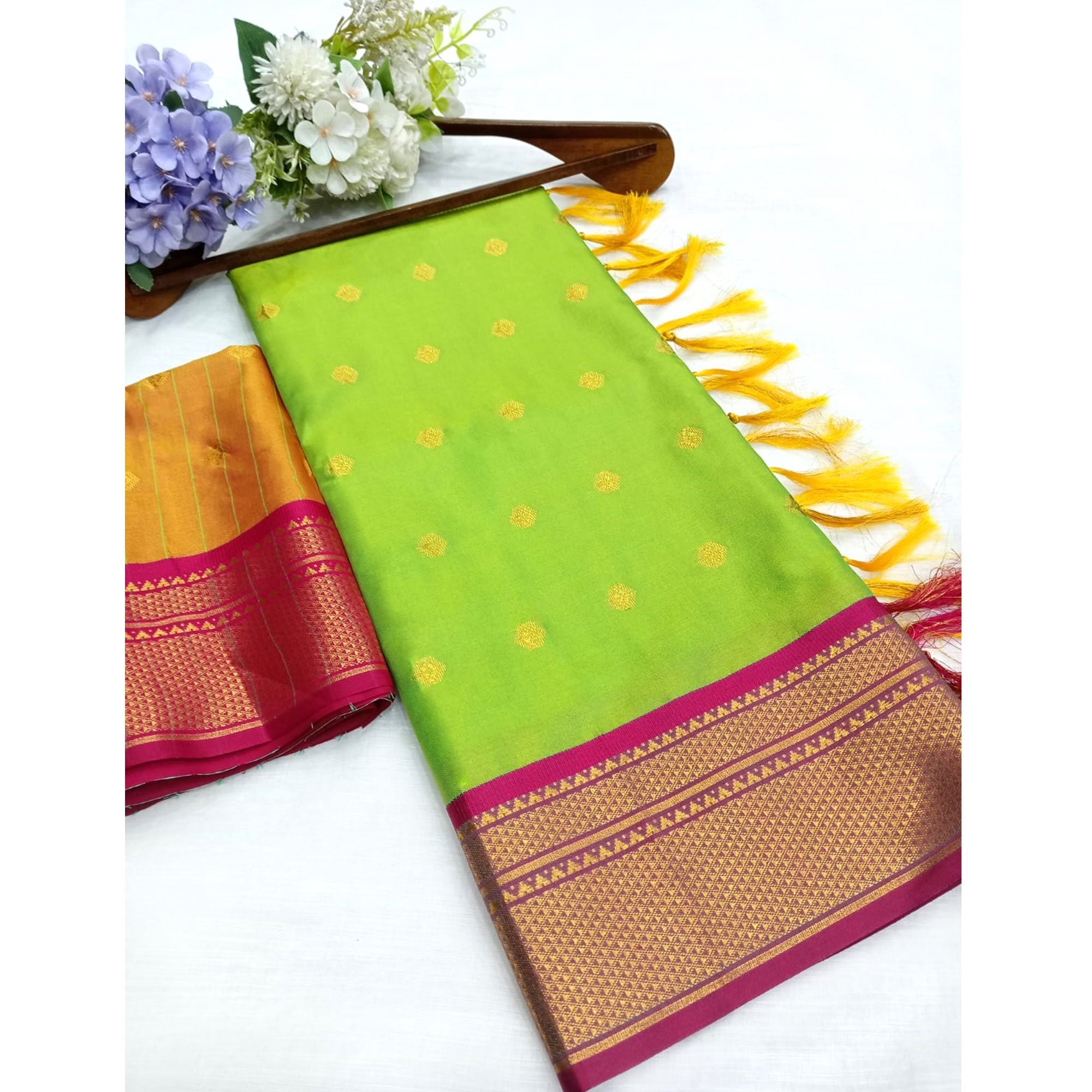 Green Zari Woven Lichi Art Silk Saree With Tassels