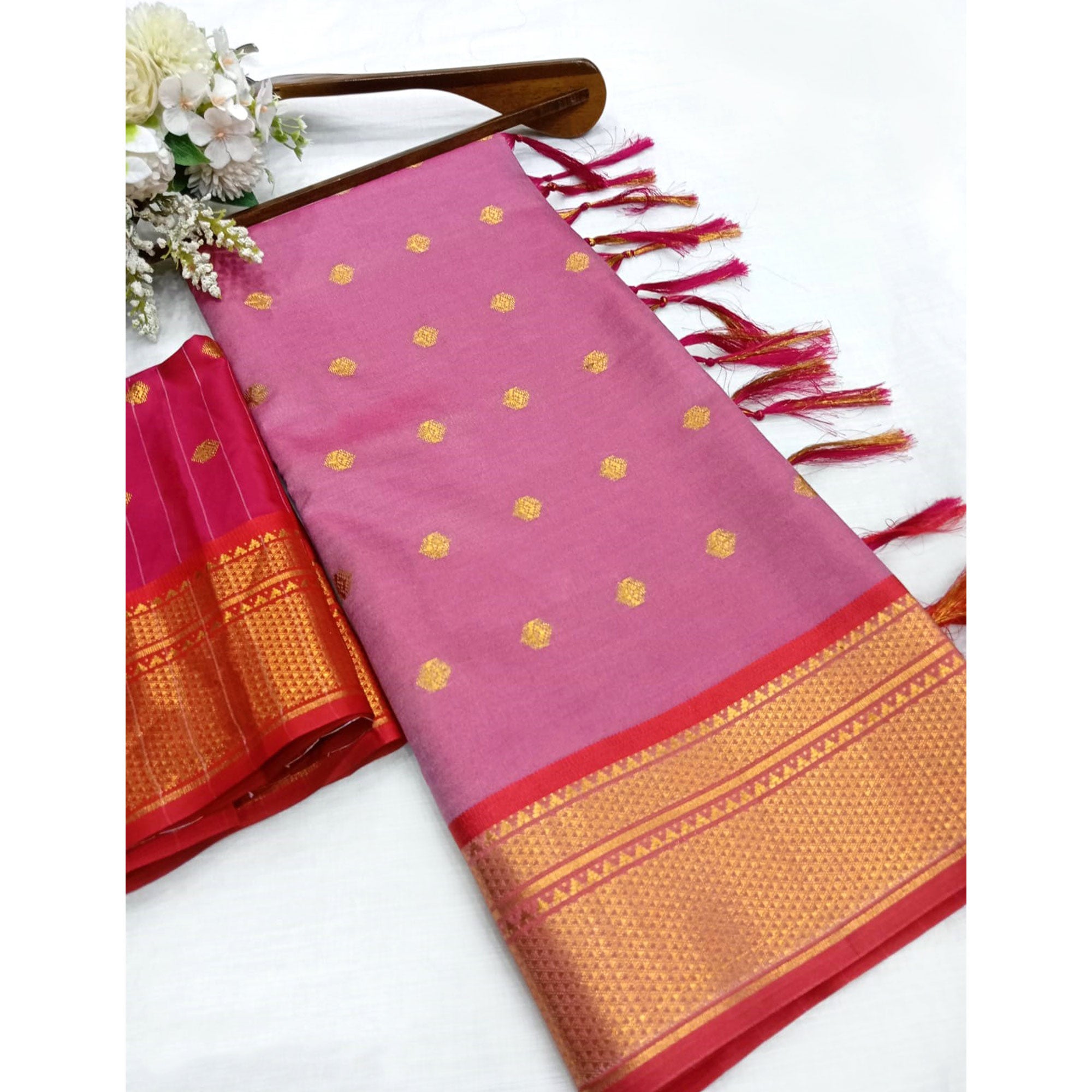 Pink Zari Woven Lichi Art Silk Saree With Tassels