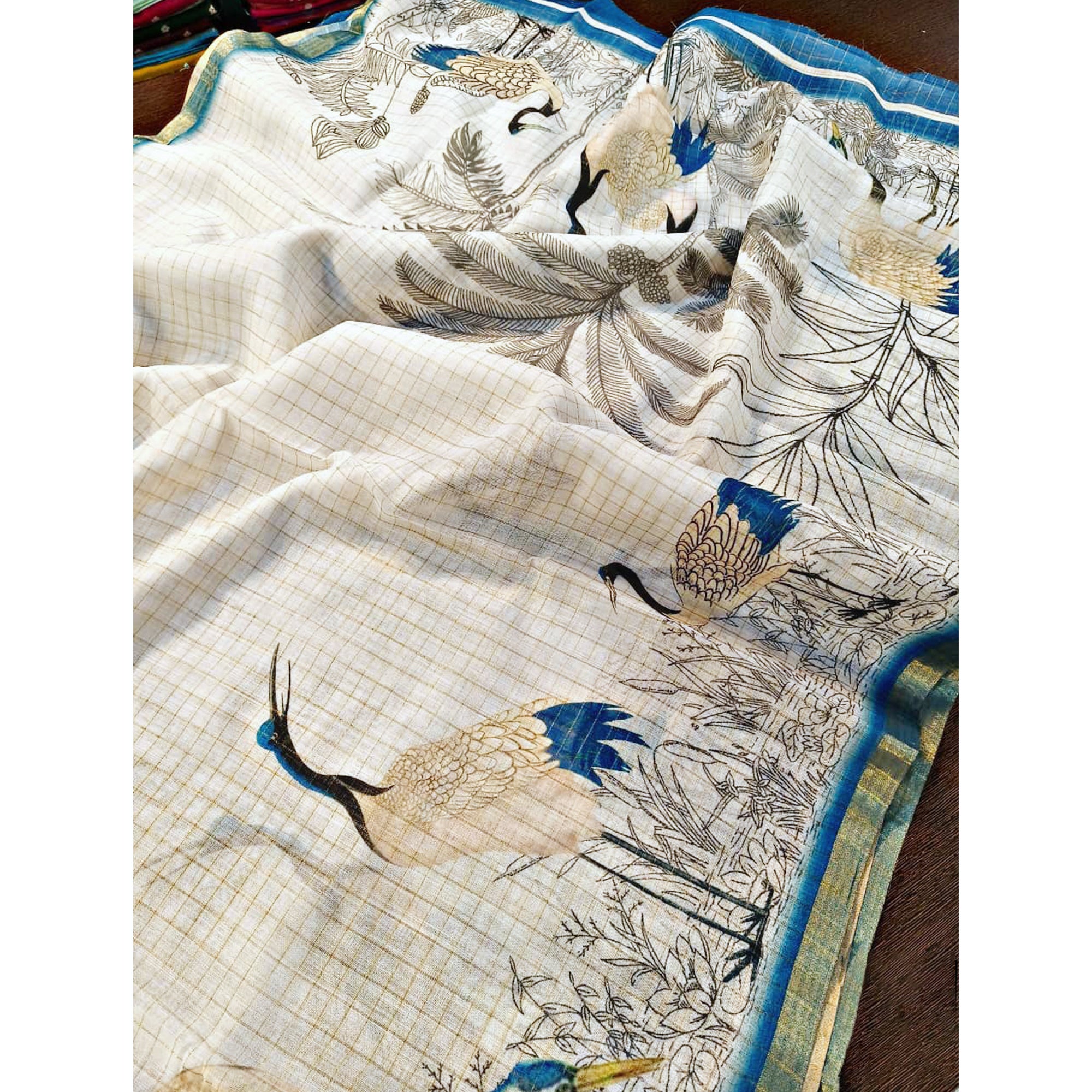 Off White and Blue Checkered Printed Linen Saree with a Breezy Feel