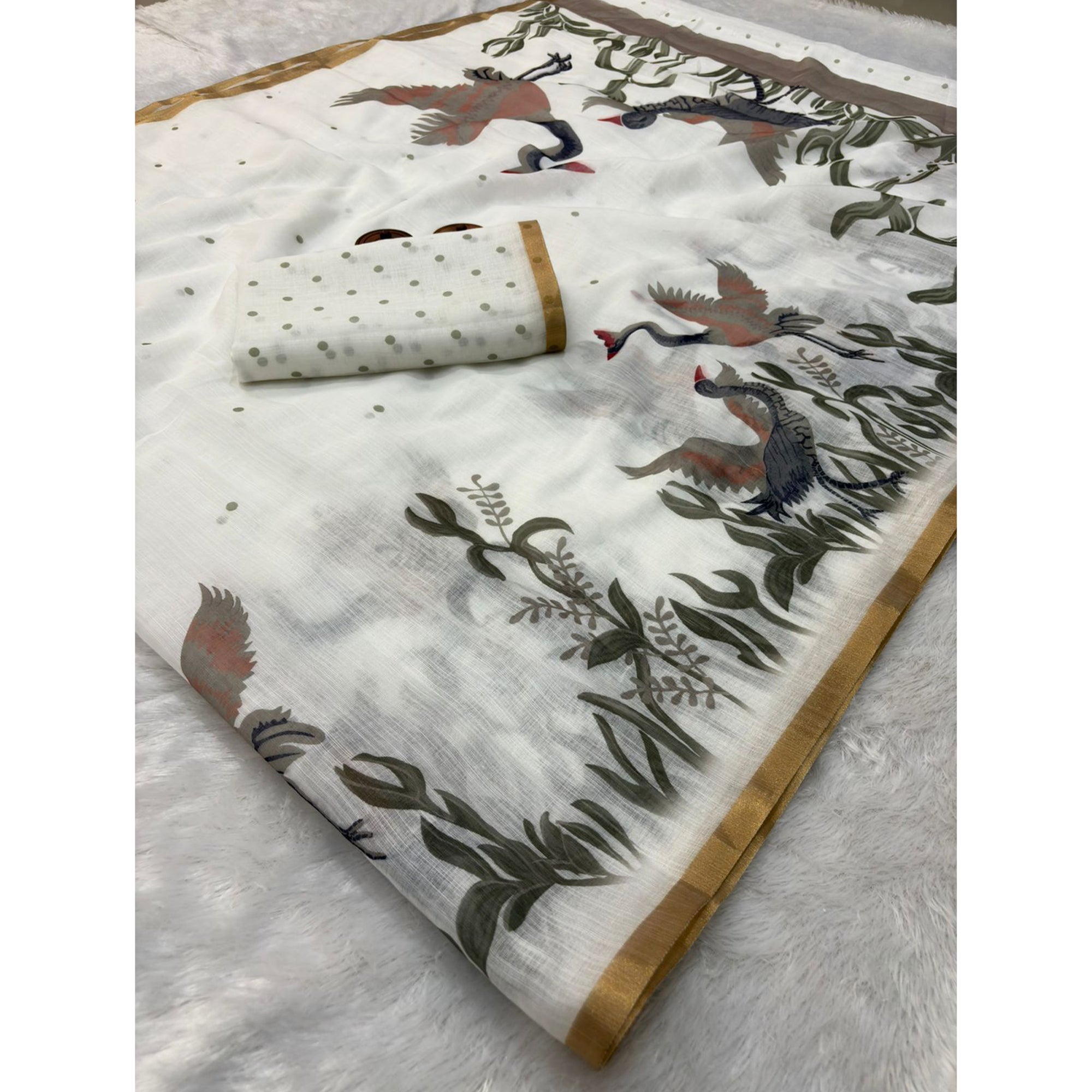 Off White Pure Linen Saree Showcasing Handprinted Patterns and Zari Finish