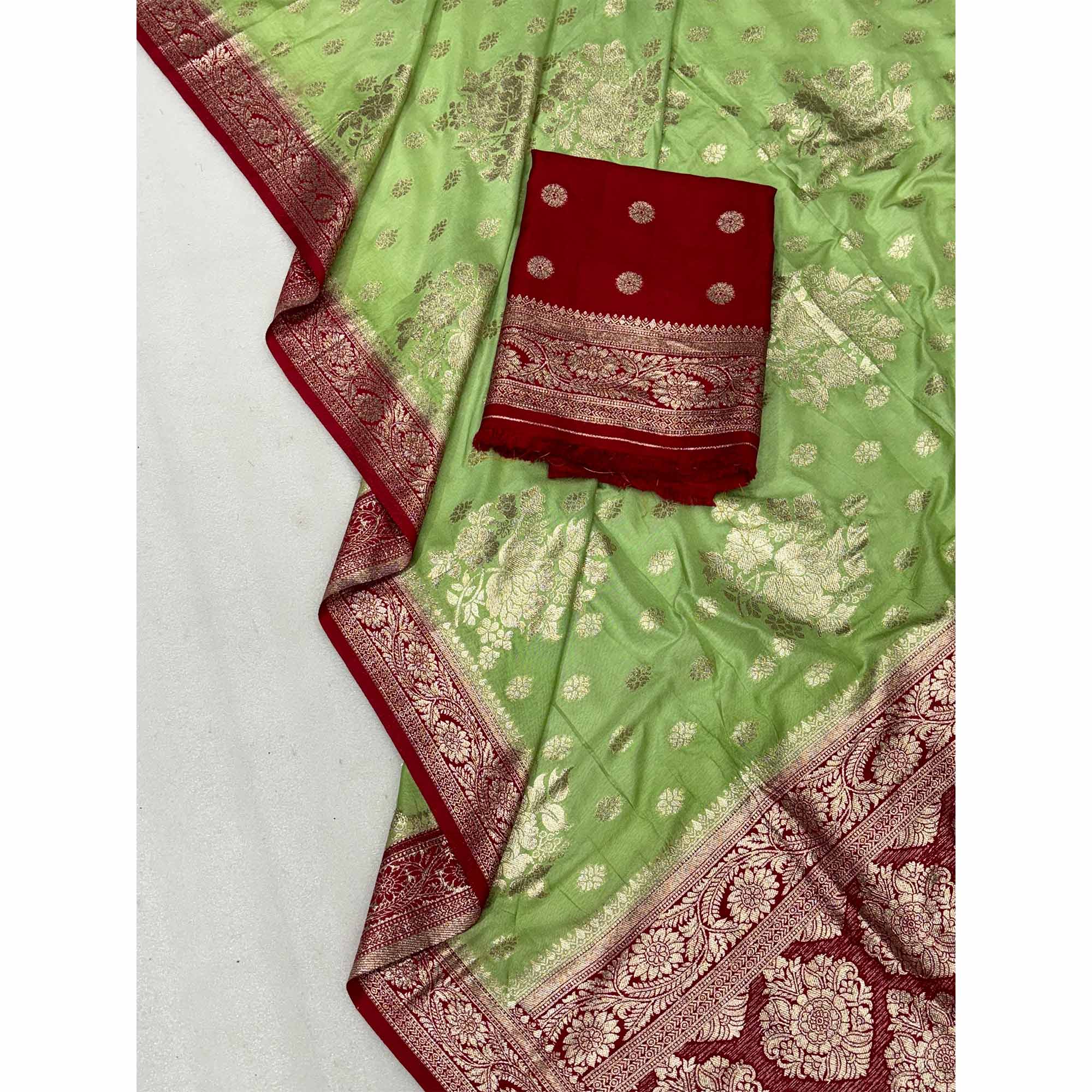 Green Dola Silk Woven Saree with Allover Zari Butti Design