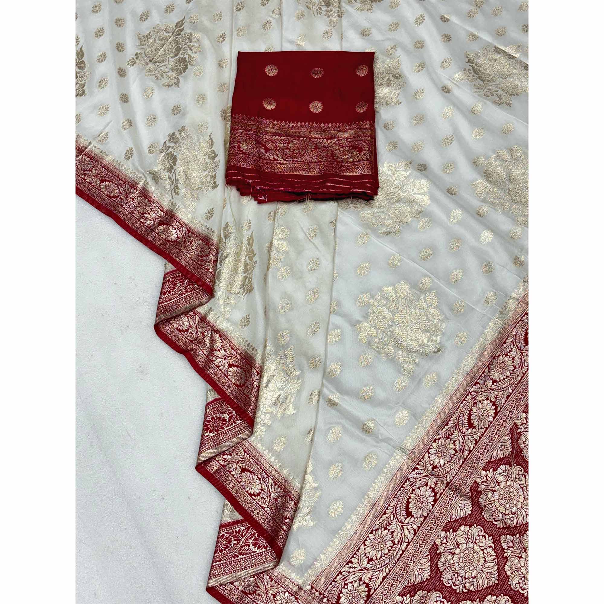 Off White Dola Silk Woven Saree with Allover Zari Butti Design