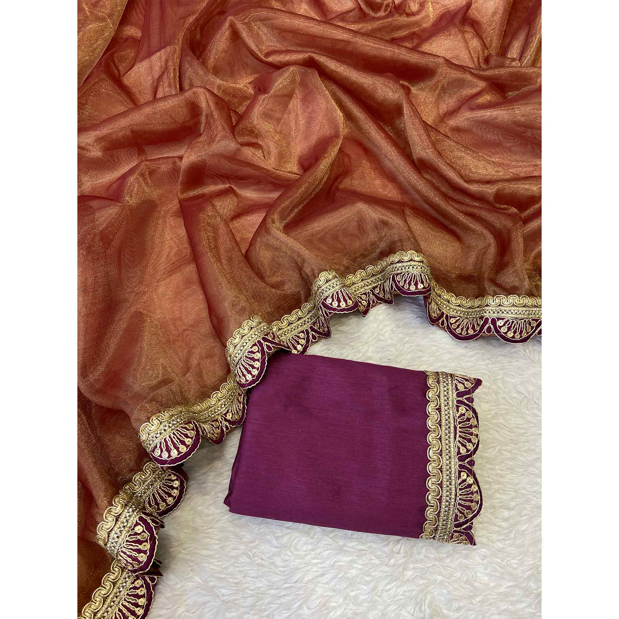 Orange Net Saree With Intricate Sequin Embroidery & Tassel Embellished Pallu