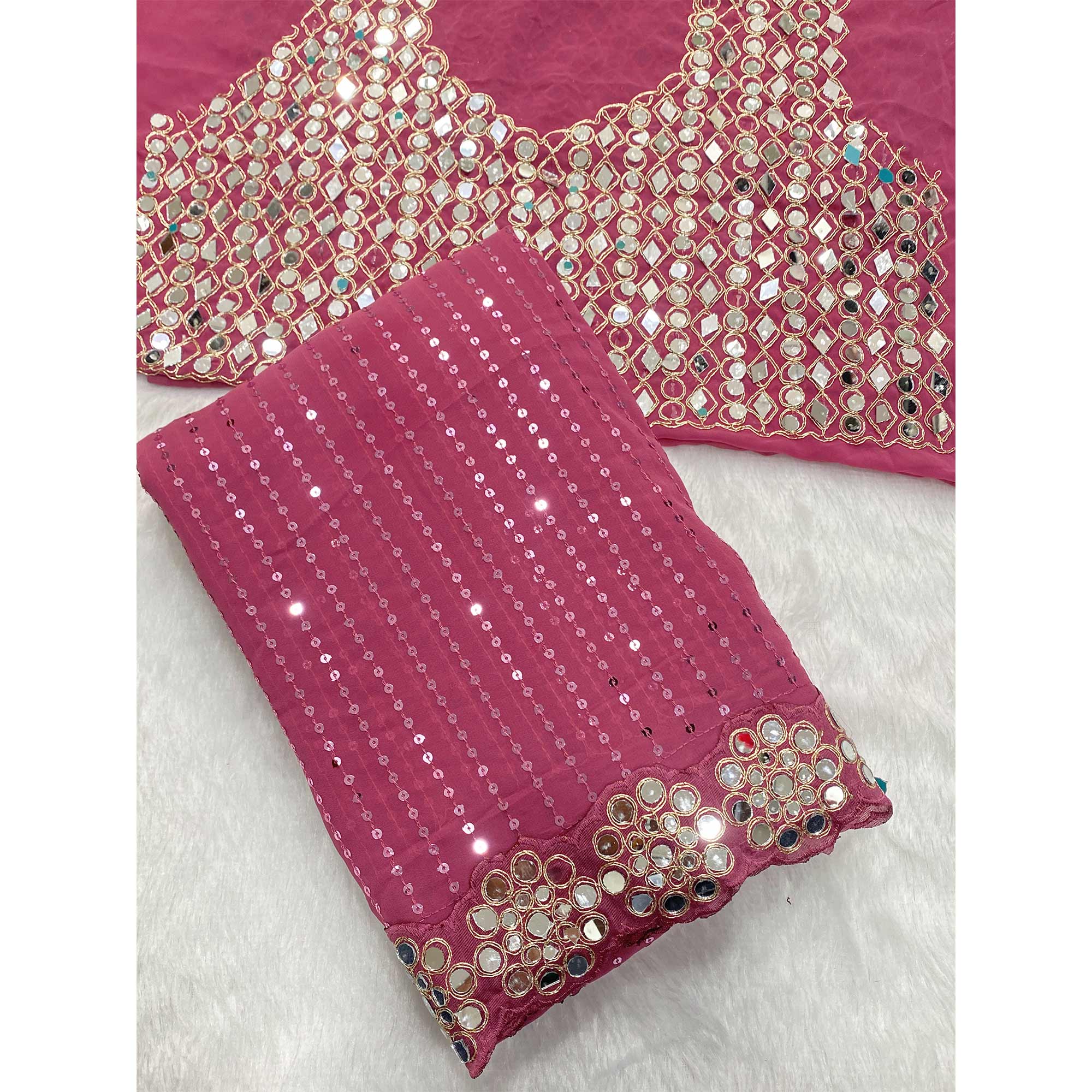Stunning Pink Georgette Party Wear Saree Adorned with Heavy Sequins Embellishment