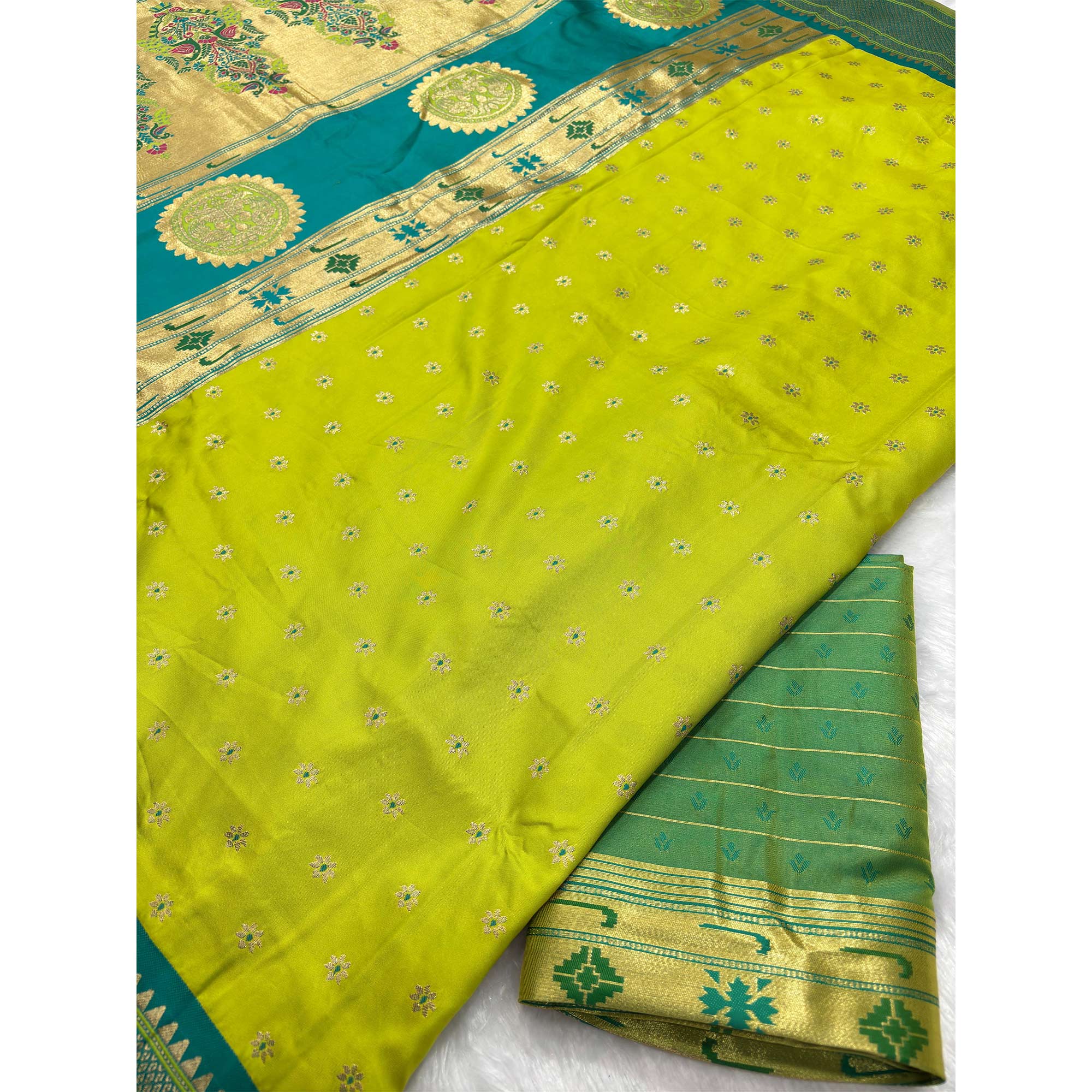 Graceful Green Silk Blend Saree Adorned With Intricate Floral Zari Weaving