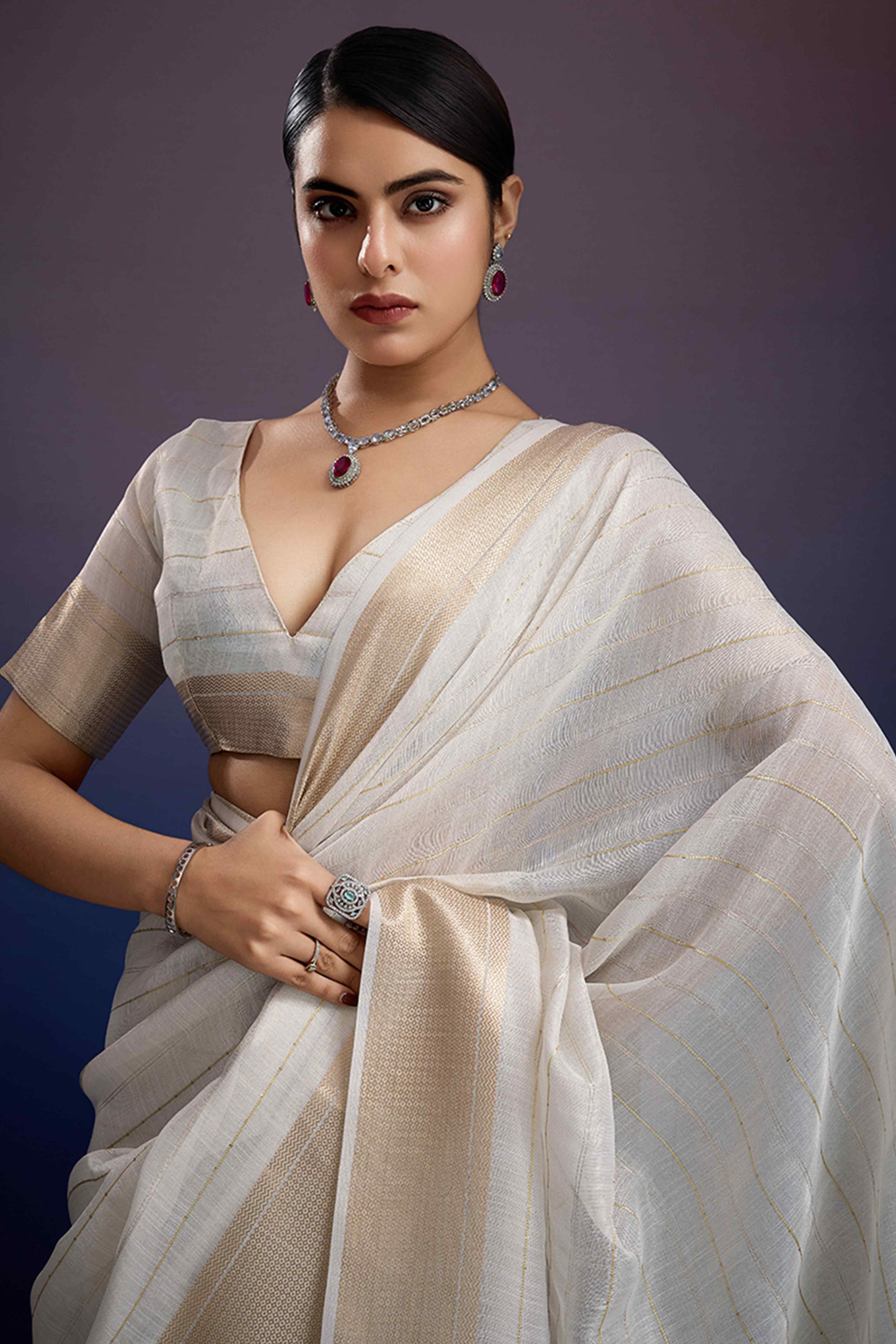 Off White Pure Linen Saree with Gold Toned Zari Weave