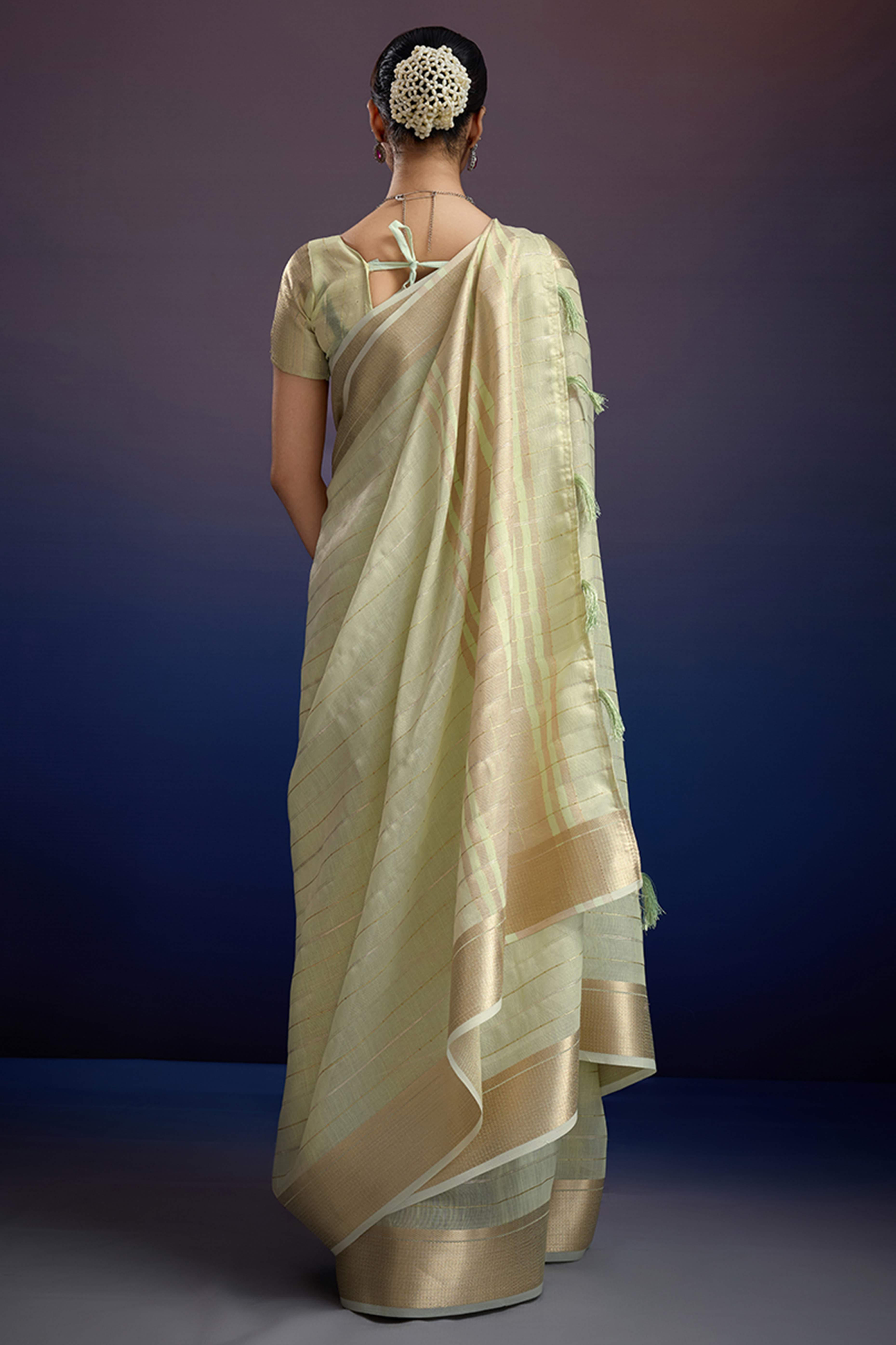 Pista Green Pure Linen Saree with Gold Toned Zari Weave