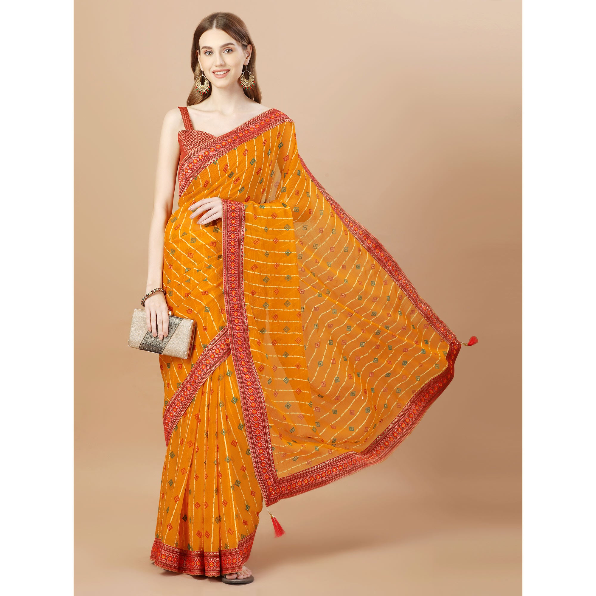 Orange Foil Printed Chiffon Saree With Lace Border