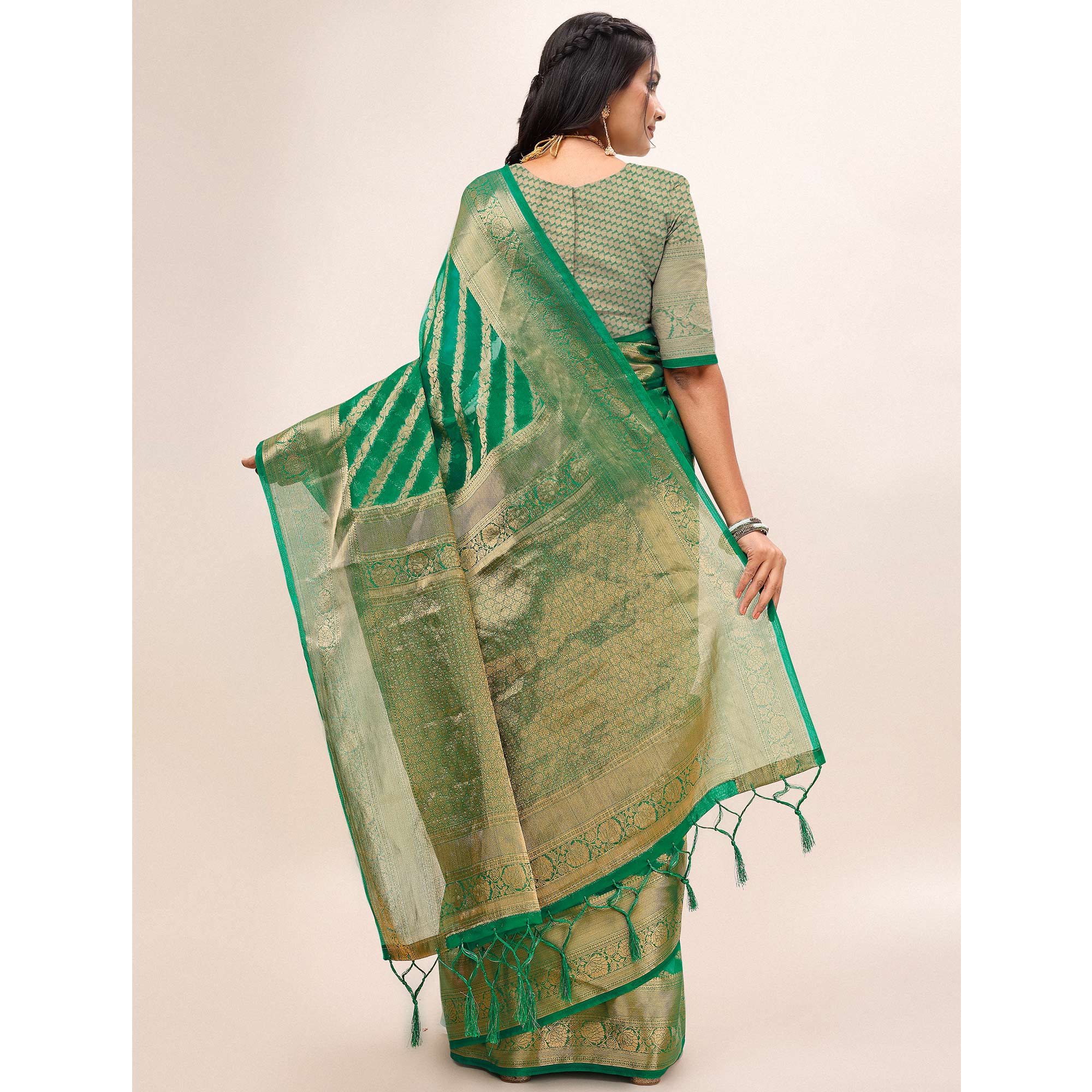 Green Woven Organza Saree With Tassels