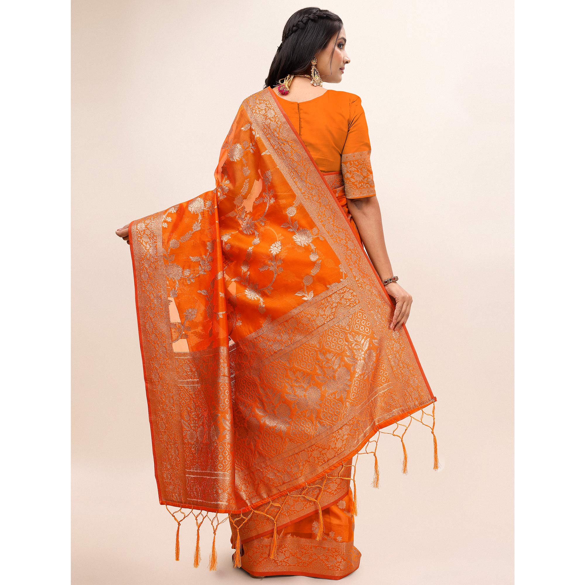 Orange Woven Organza Saree With Tassels