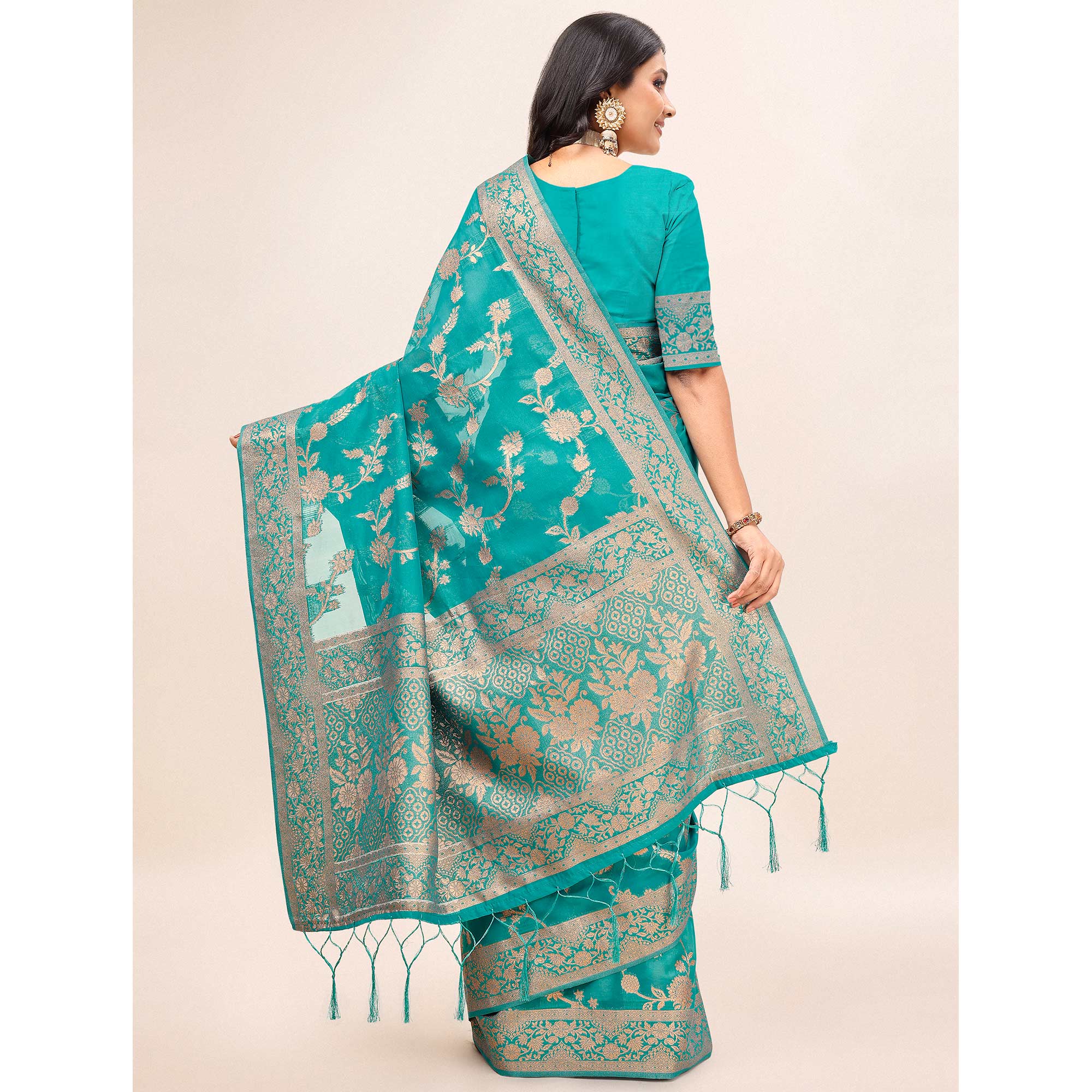 Rama Green Woven Organza Saree With Tassels