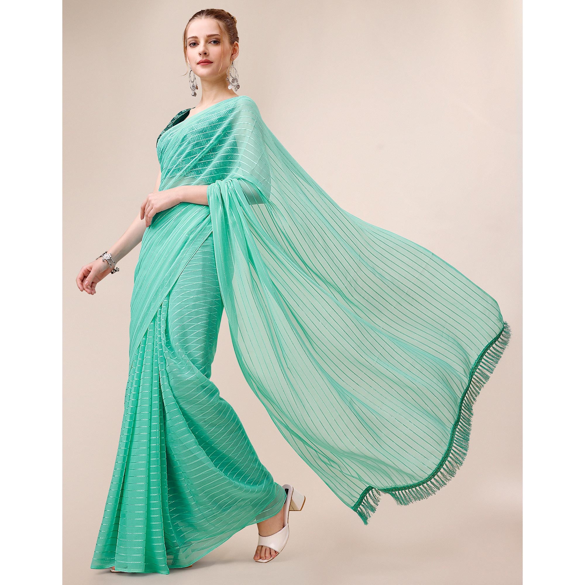 Turquoise Embroidered Georgette Saree