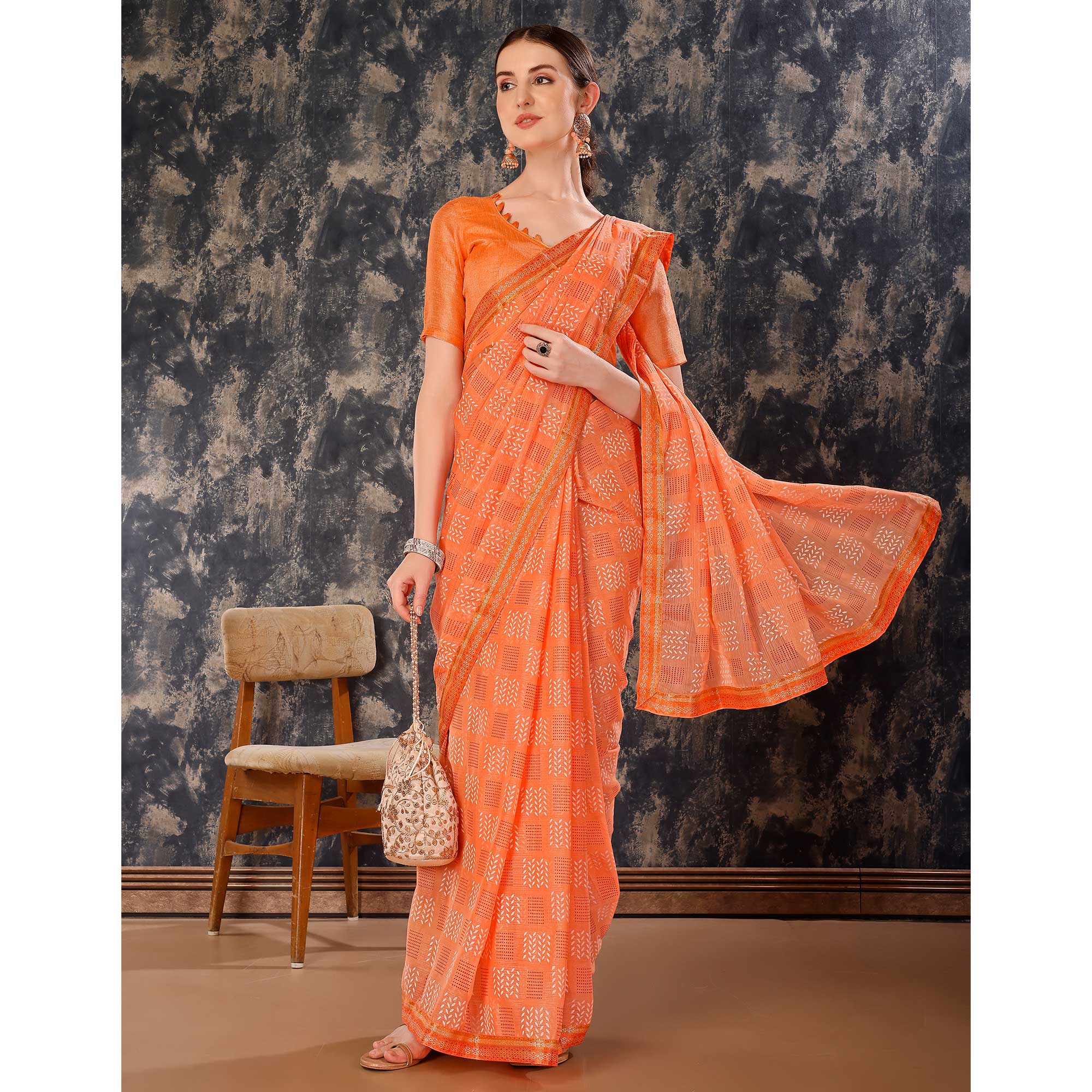 Light Orange Printed Chiffon Saree With Lace Border