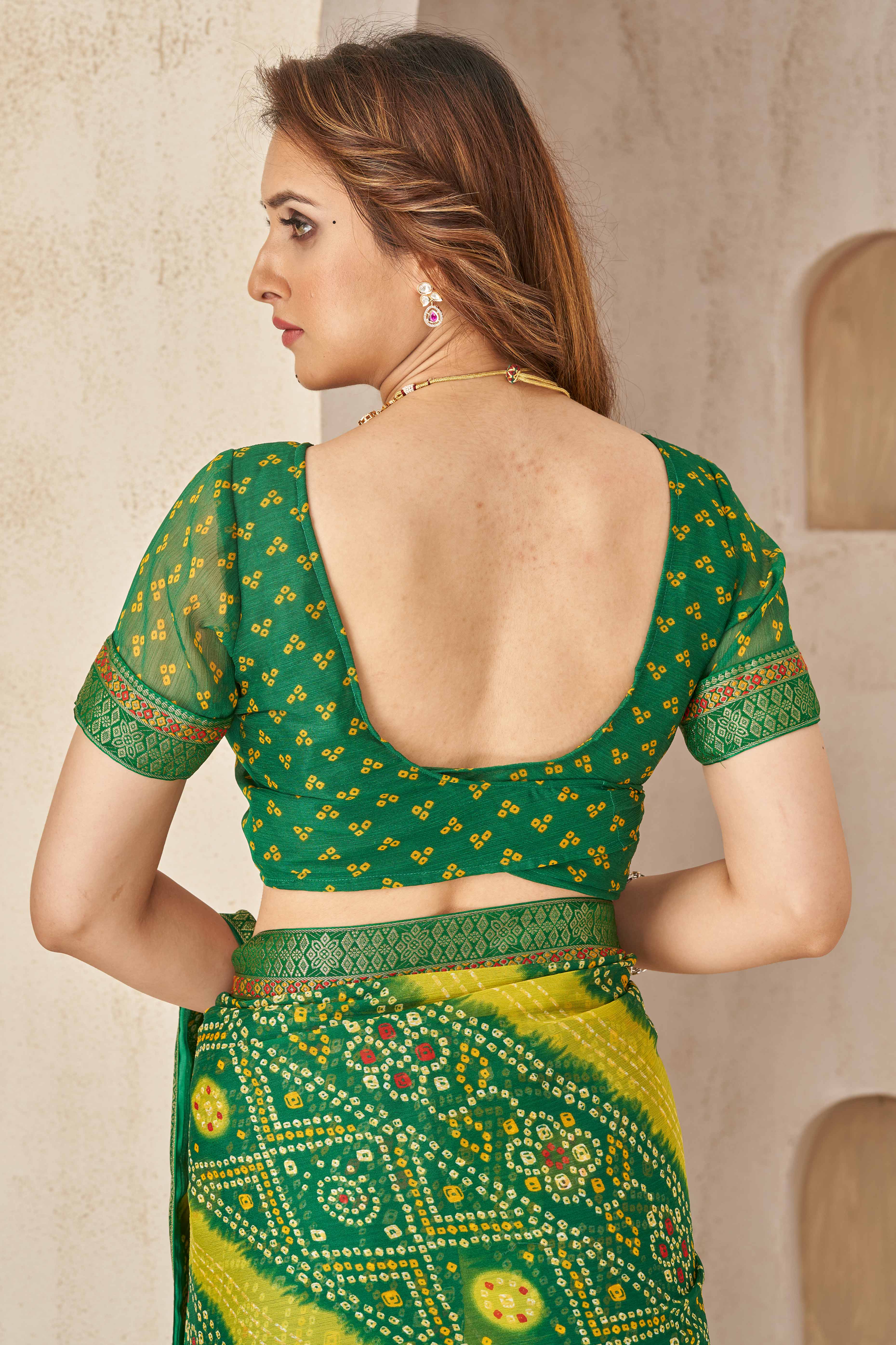 Green Bandhani Printed Chiffon Saree Enhanced with Delicate Lace Border Work