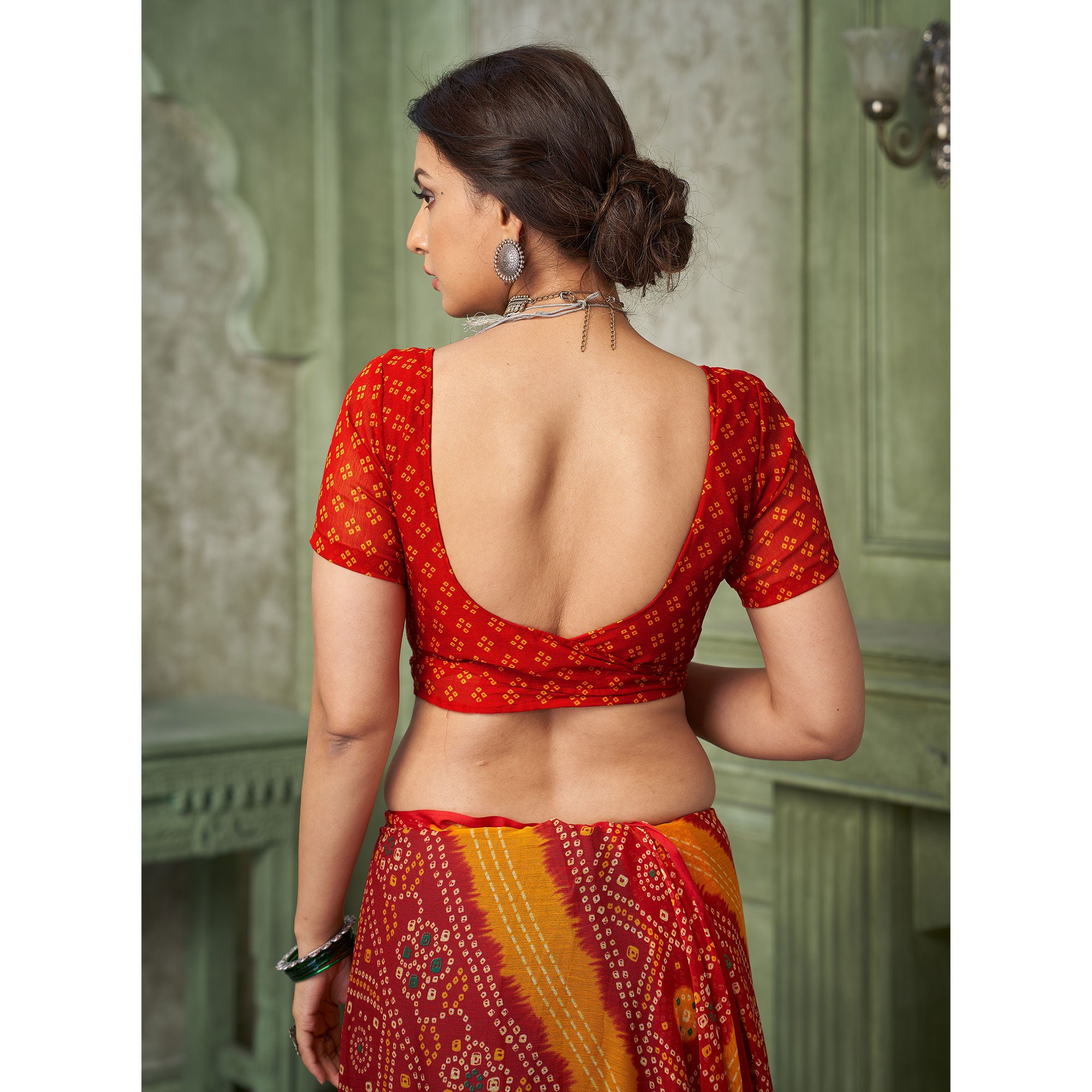 Red Chiffon Saree Adorned With Traditional Bandhani Print
