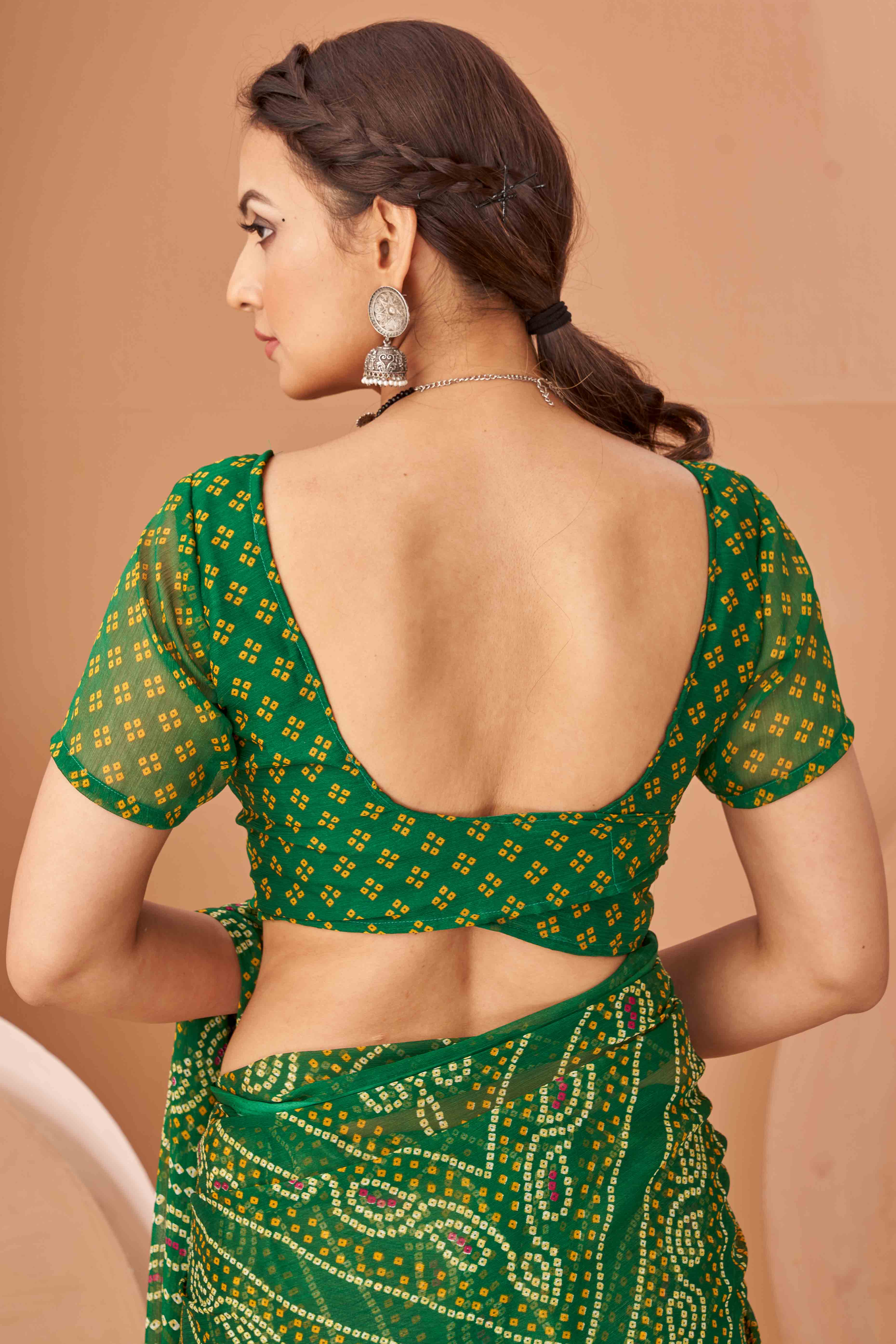 Green Bandhani Printed Chiffon Saree Accented With Intricate Lace Border Work