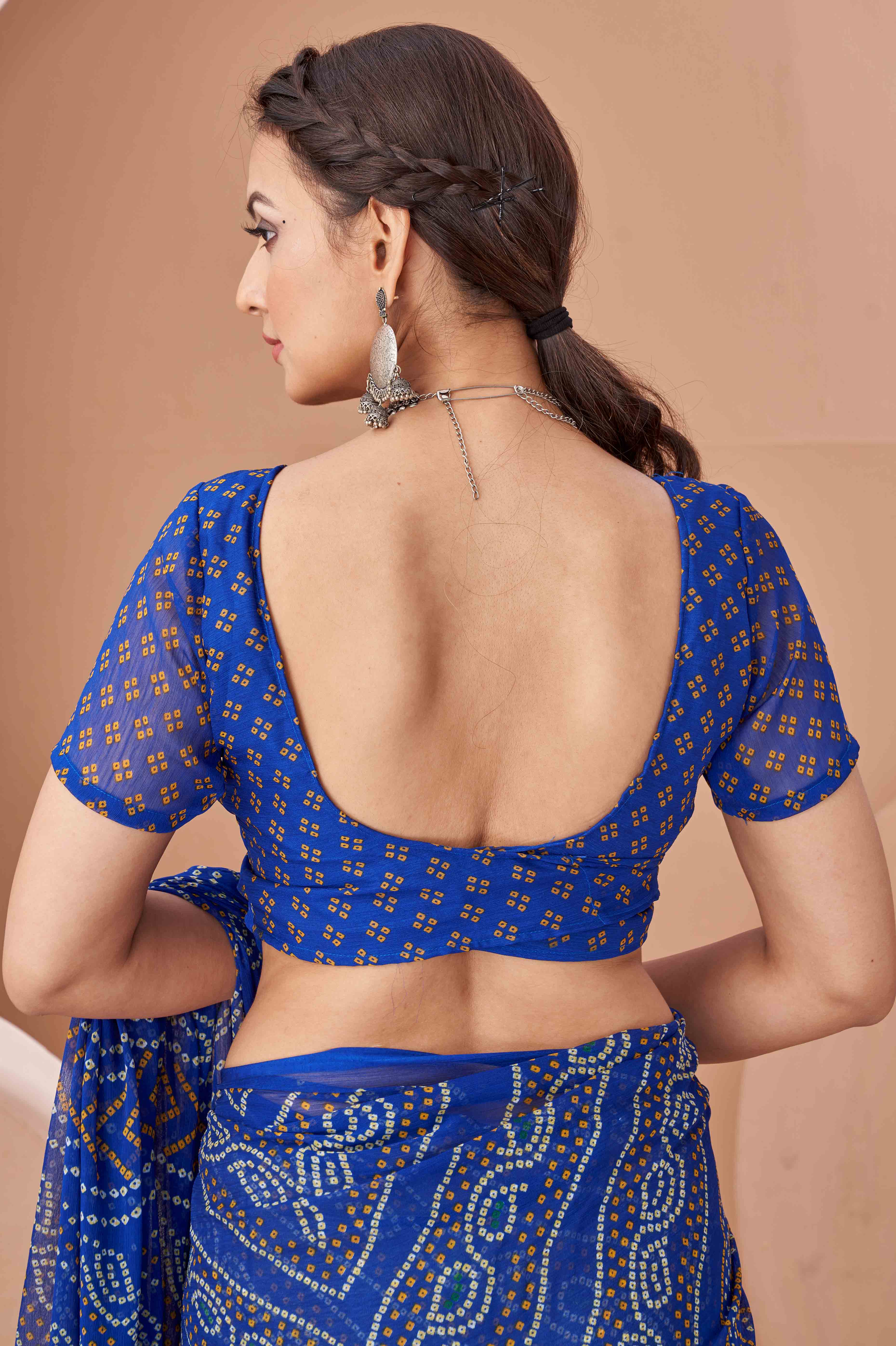 Blue Bandhani Printed Chiffon Saree Accented With Intricate Lace Border Work