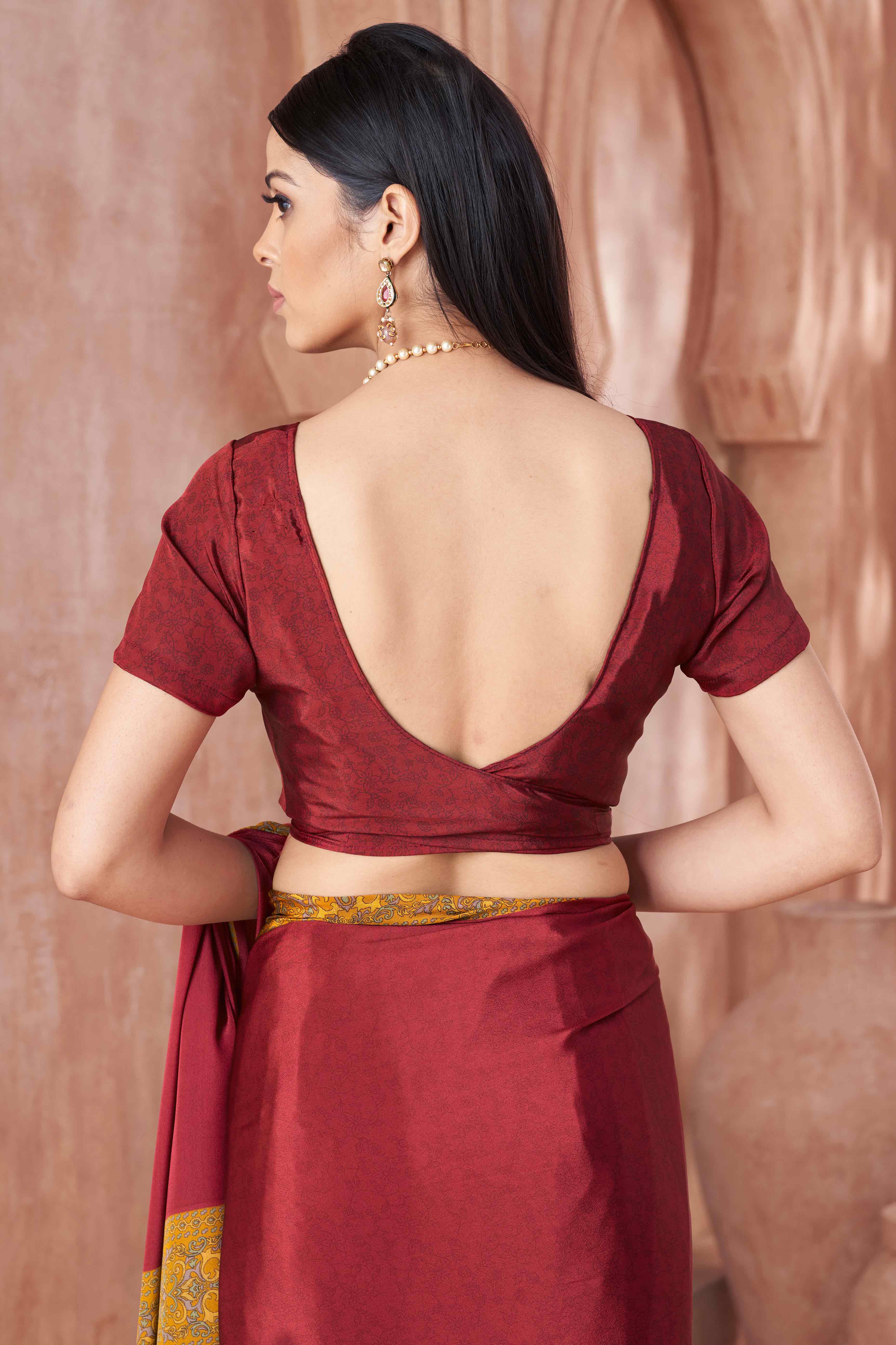 Maroon Crepe Silk Saree with Elegant Floral Print Detailing