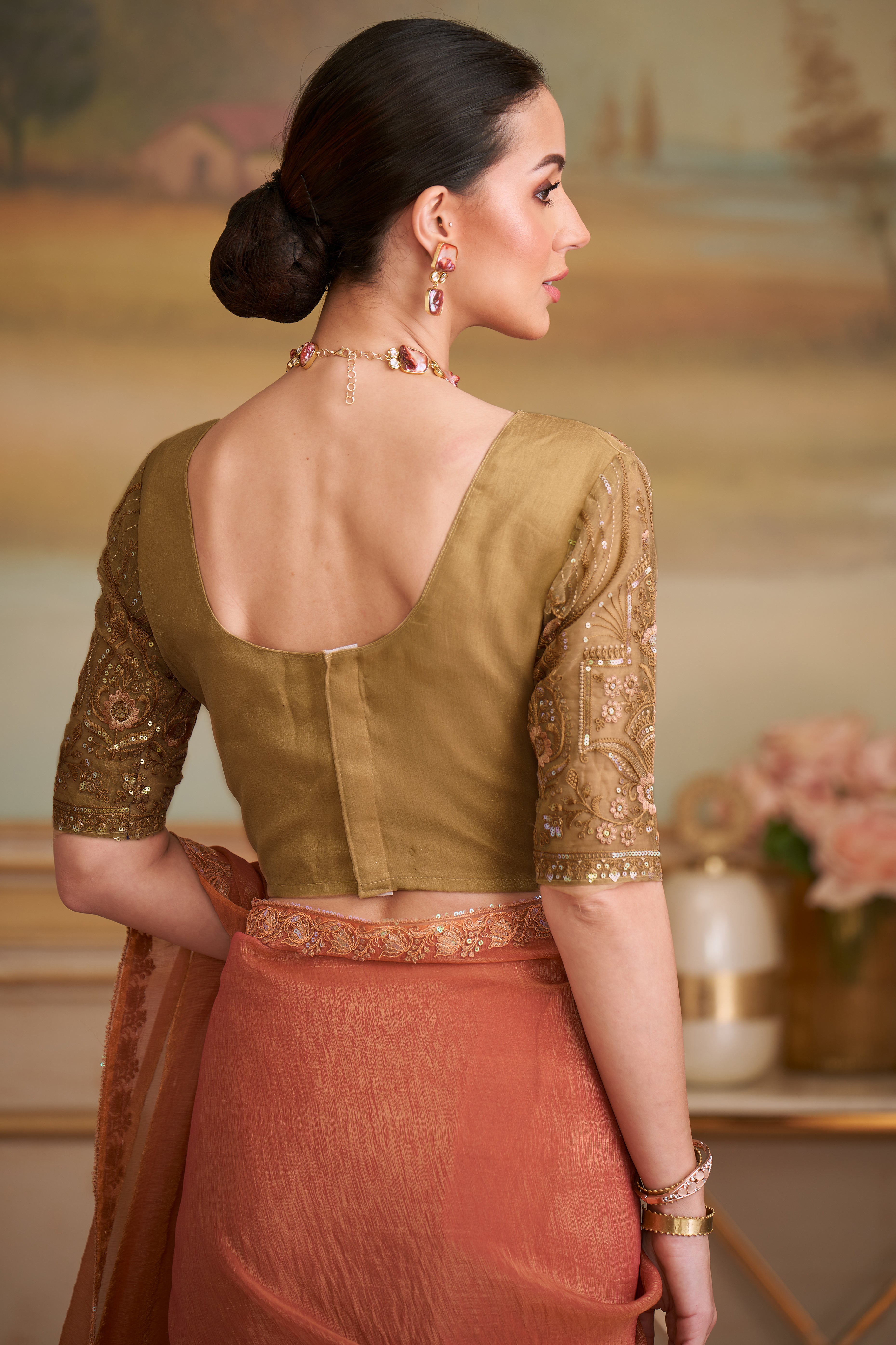 Sophisticated Rust Orange Gold Georgette Saree Accented With Floral Sequins Embroidered Lace Border