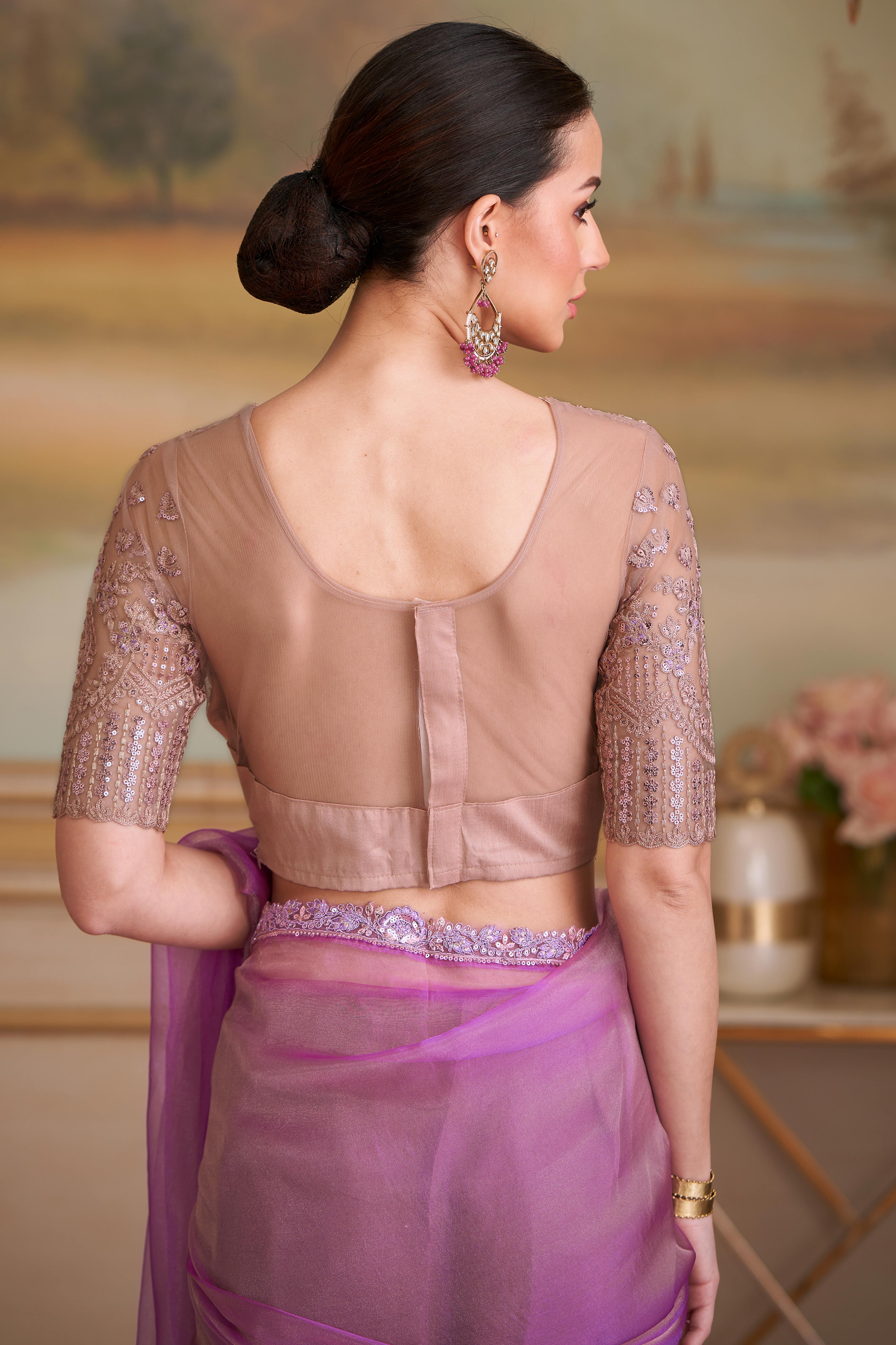 Lustrous Light Magenta Solid Tissue Silk Saree Showcasing Sequins Embroidered & Stylish Lace Border