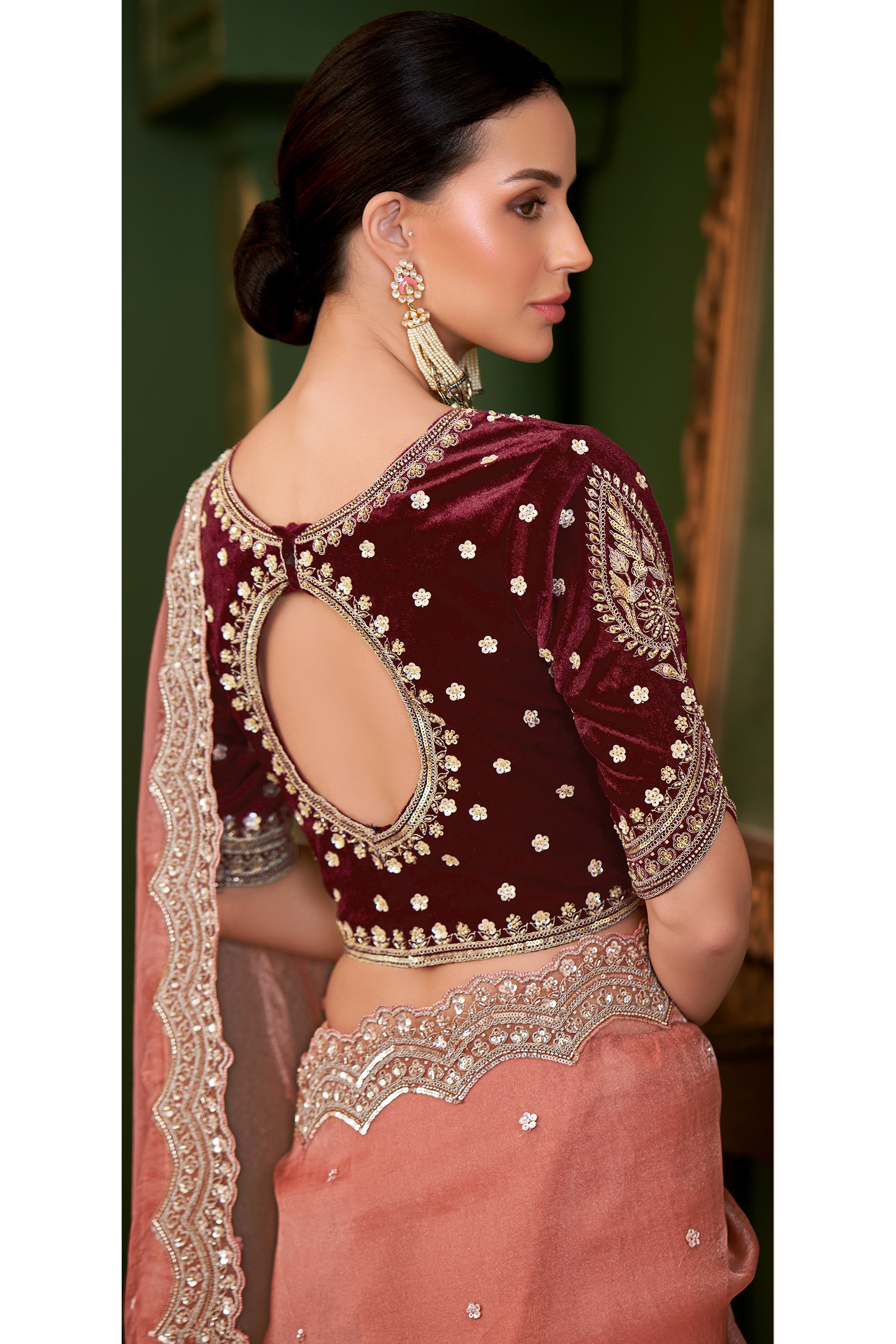 Charming Peach Georgette Saree Adorned With Floral Cording Sequins Embroidery & Cutwork Border