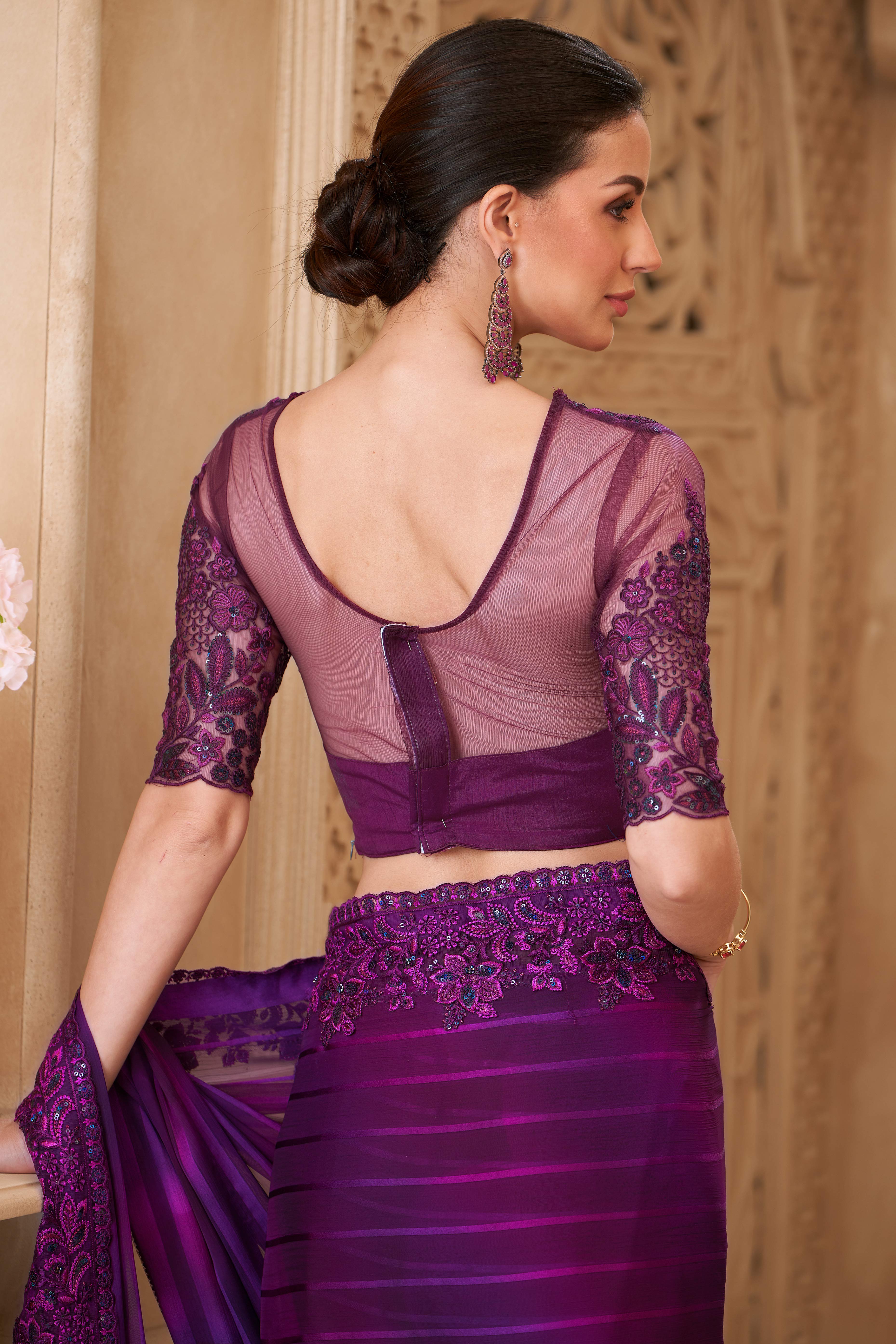 Shimmering Purple Georgette Saree with Graceful Thread Embellishment and Sequins