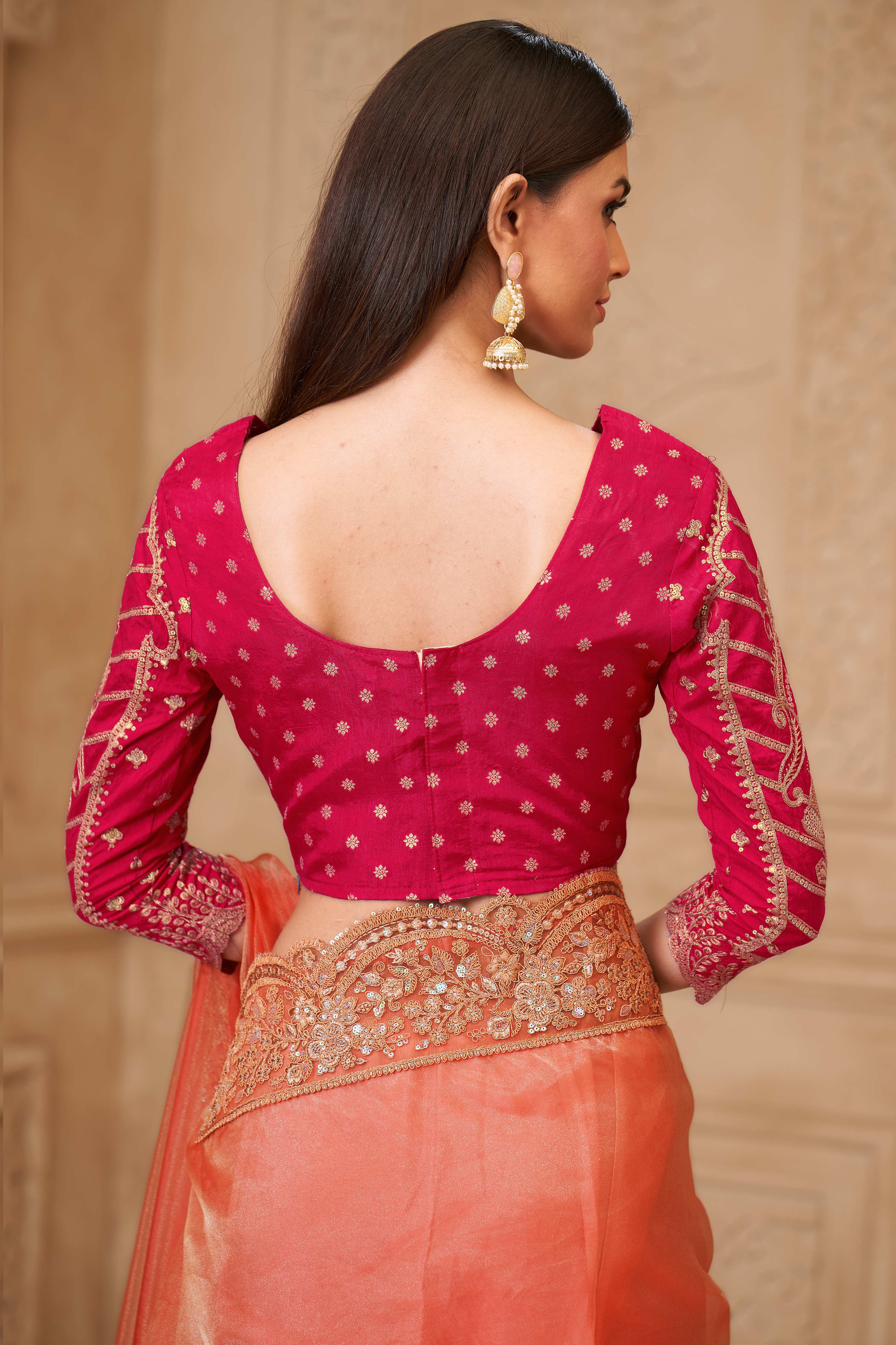 Shimmering Orange Georgette Saree with Graceful Thread Embellishment and Sequins