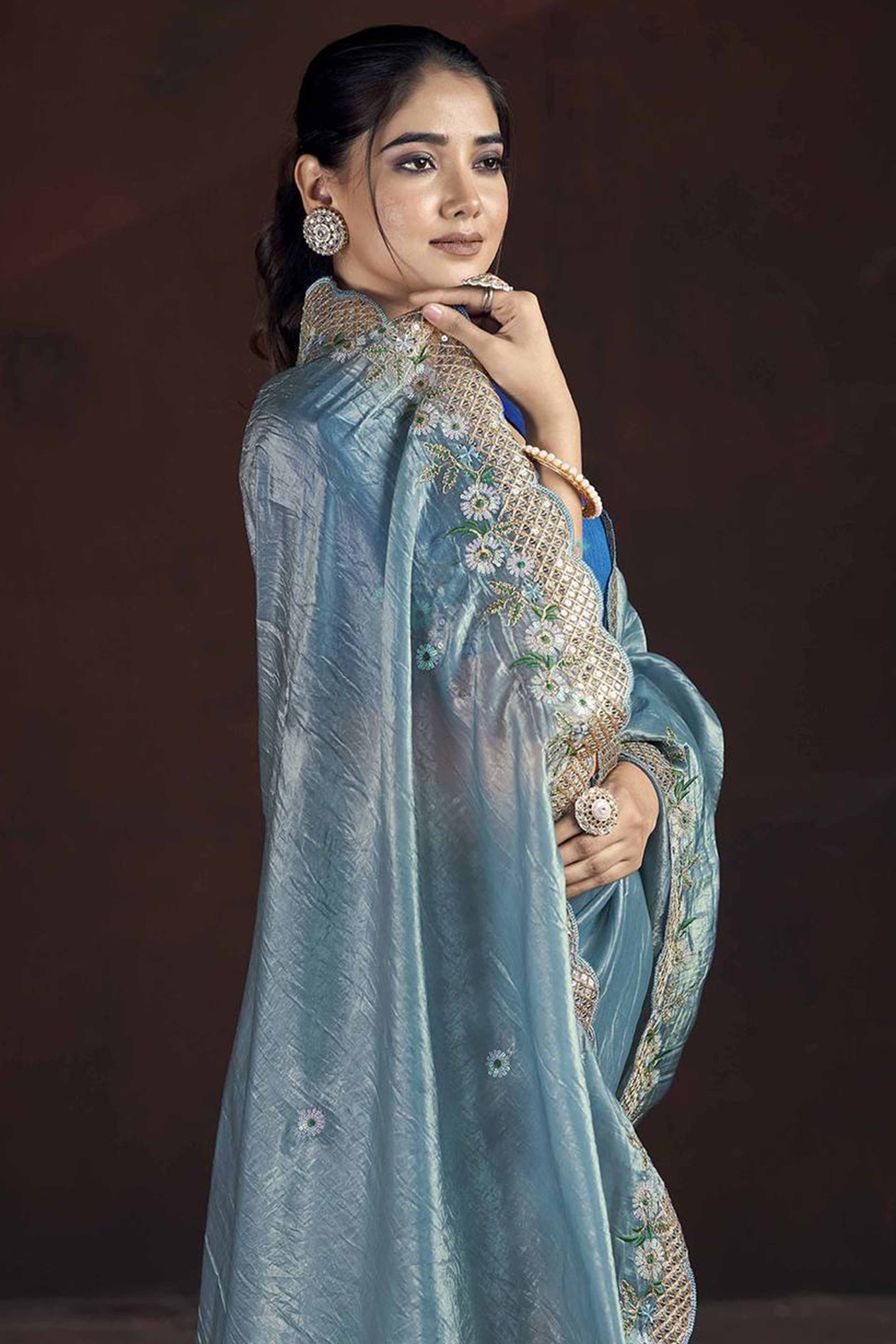 Blue Organza Saree with Embroidery on the Edges for a Graceful Contemporary Look