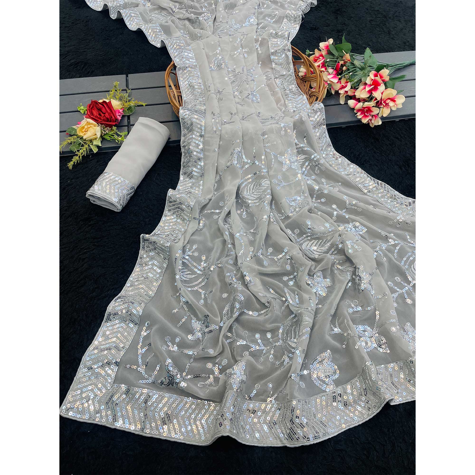 Grey Sequins Embellished Georgette Saree with Delicate Embroidery and Sheer Grace