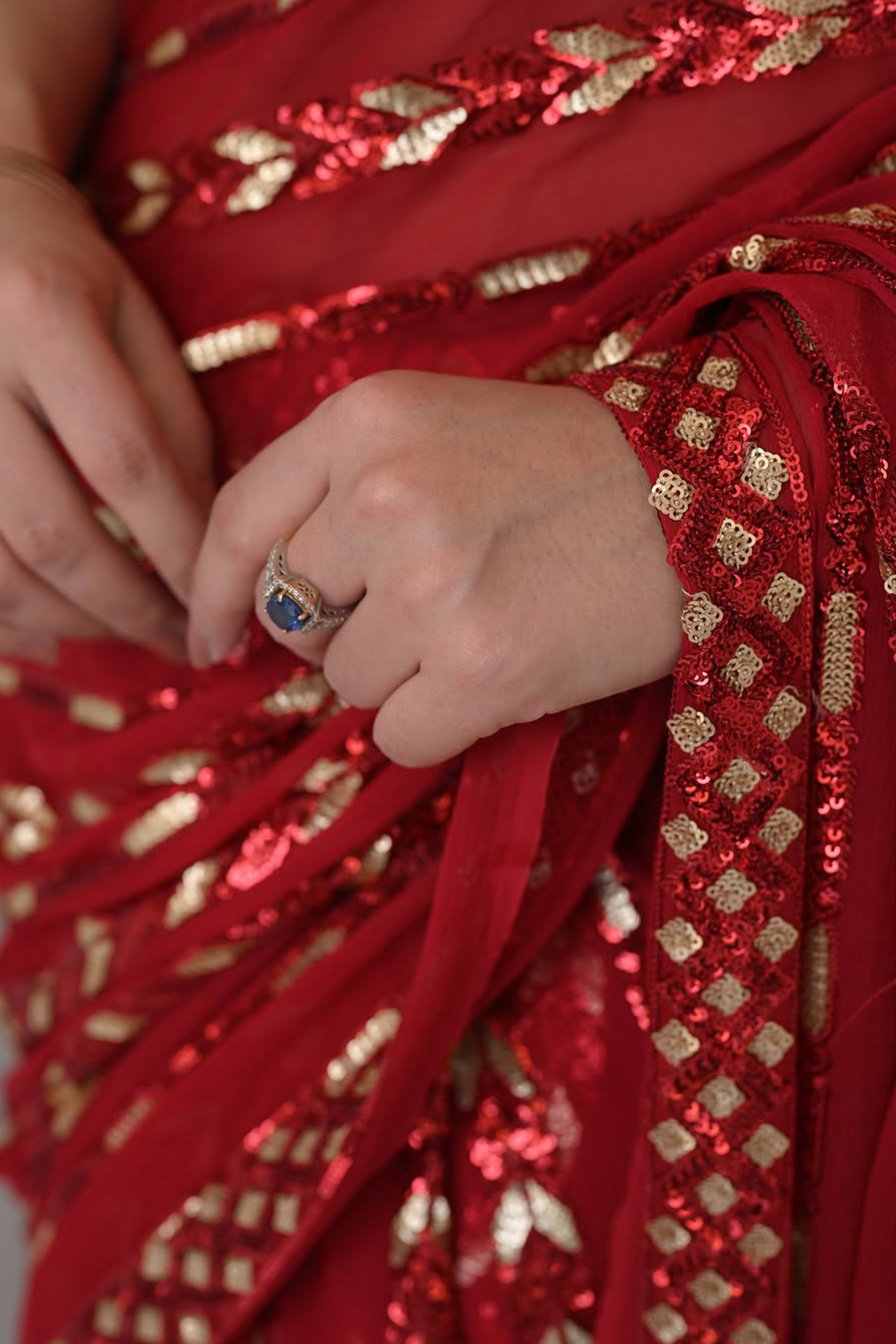 Stylish Red Striped Georgette Saree Featuring All-Over Sequin Embroidery