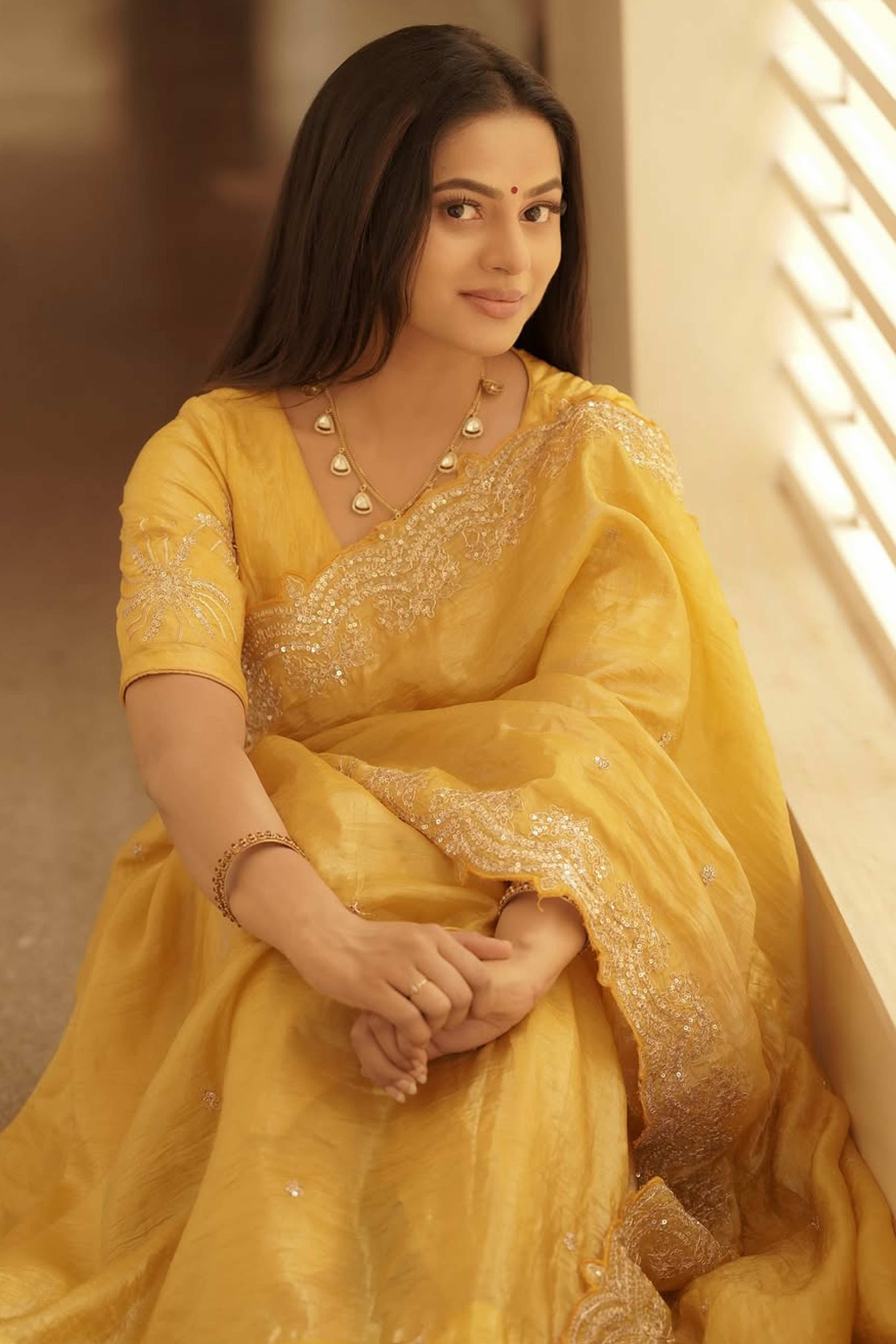 Golden Silk Blend Saree Accented with Sparkling Sequin Embellished