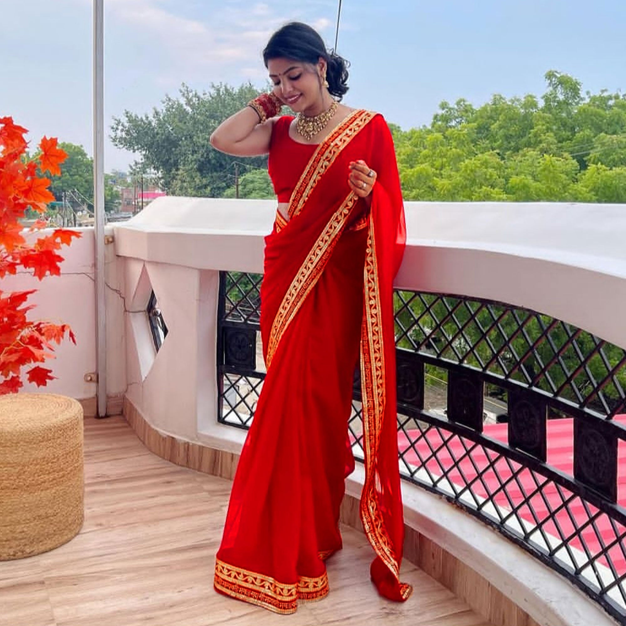 Red Solid With Embroidered Border Georgette Saree