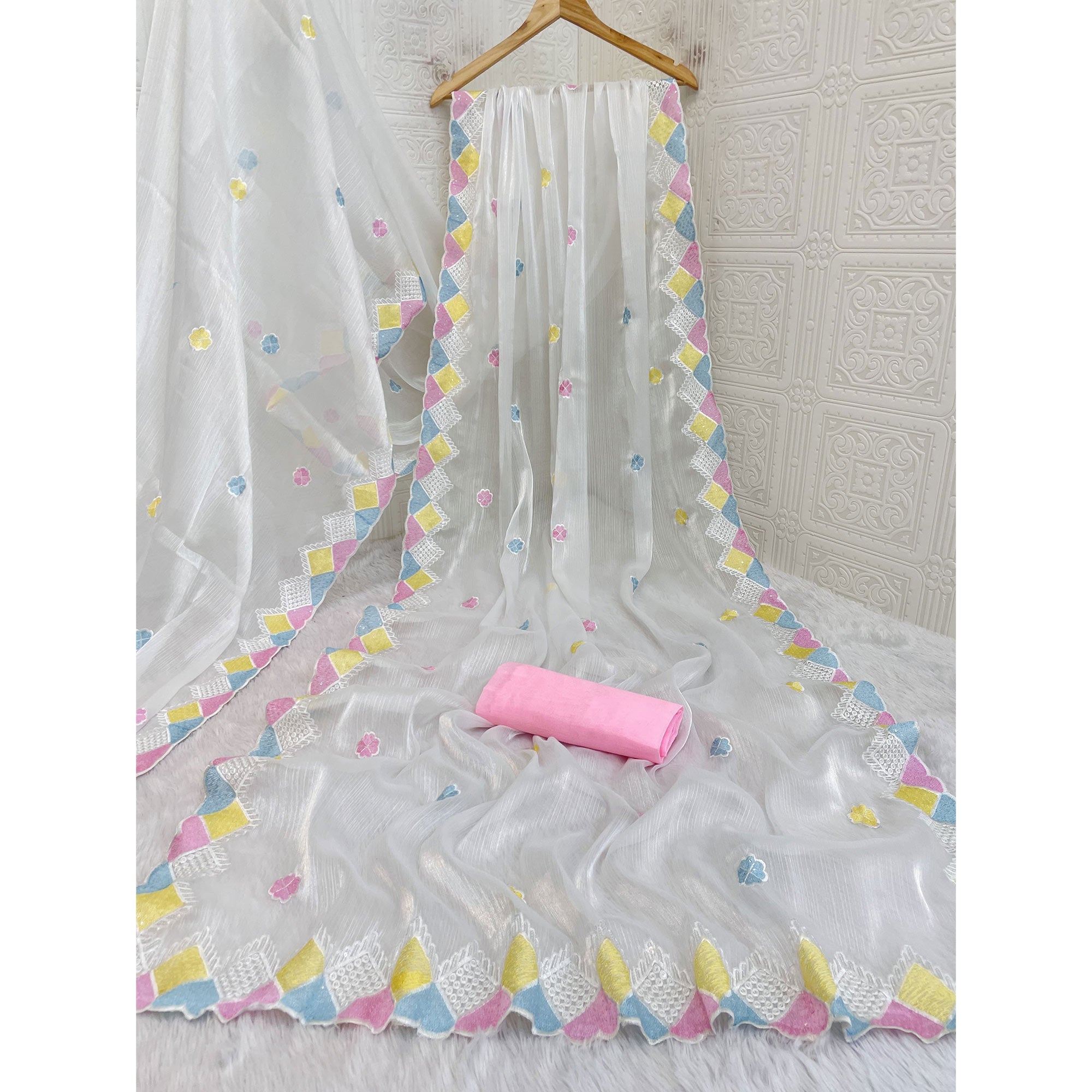 Graceful White Chiffon Silk Saree Adorned With Delicate Floral Sequin Work