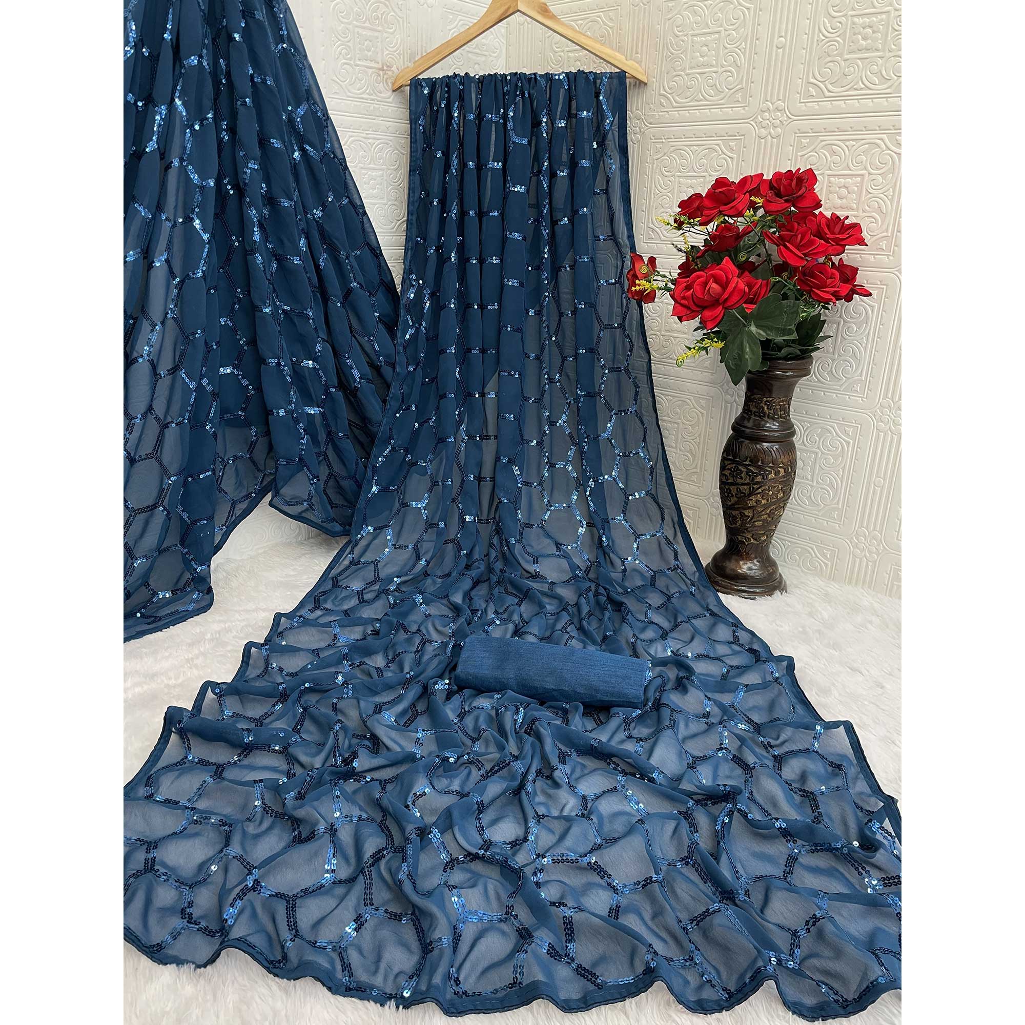Blue Georgette Silk Saree Embellished With Sparkling Sequins Embroidery & Piping Border