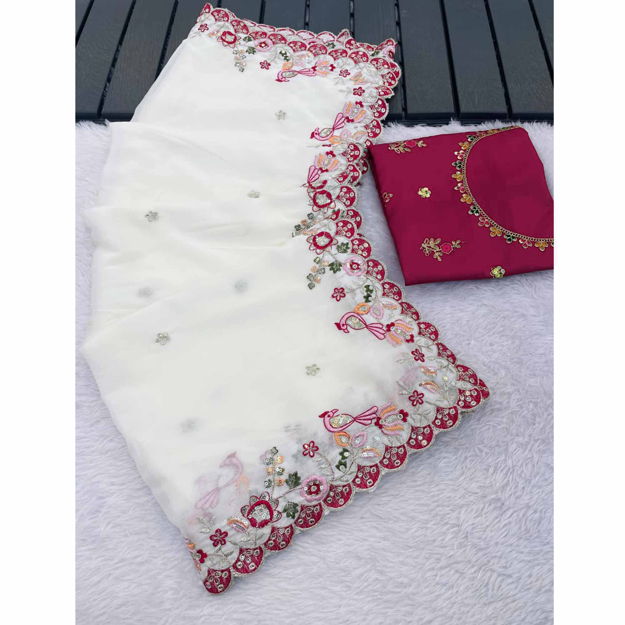 Stylish Off White Georgette Partywear Saree with Beautifully Embroidered Border Detailing