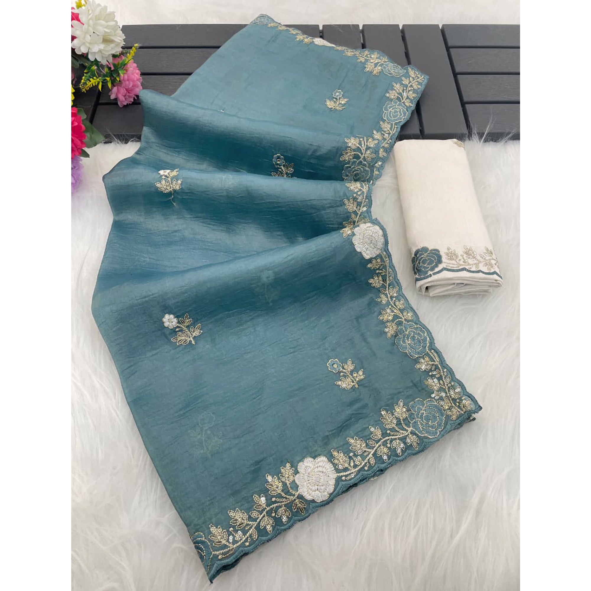 Blue Lightweight Georgette Crush Saree Adorned with Delicate Floral Embroidery