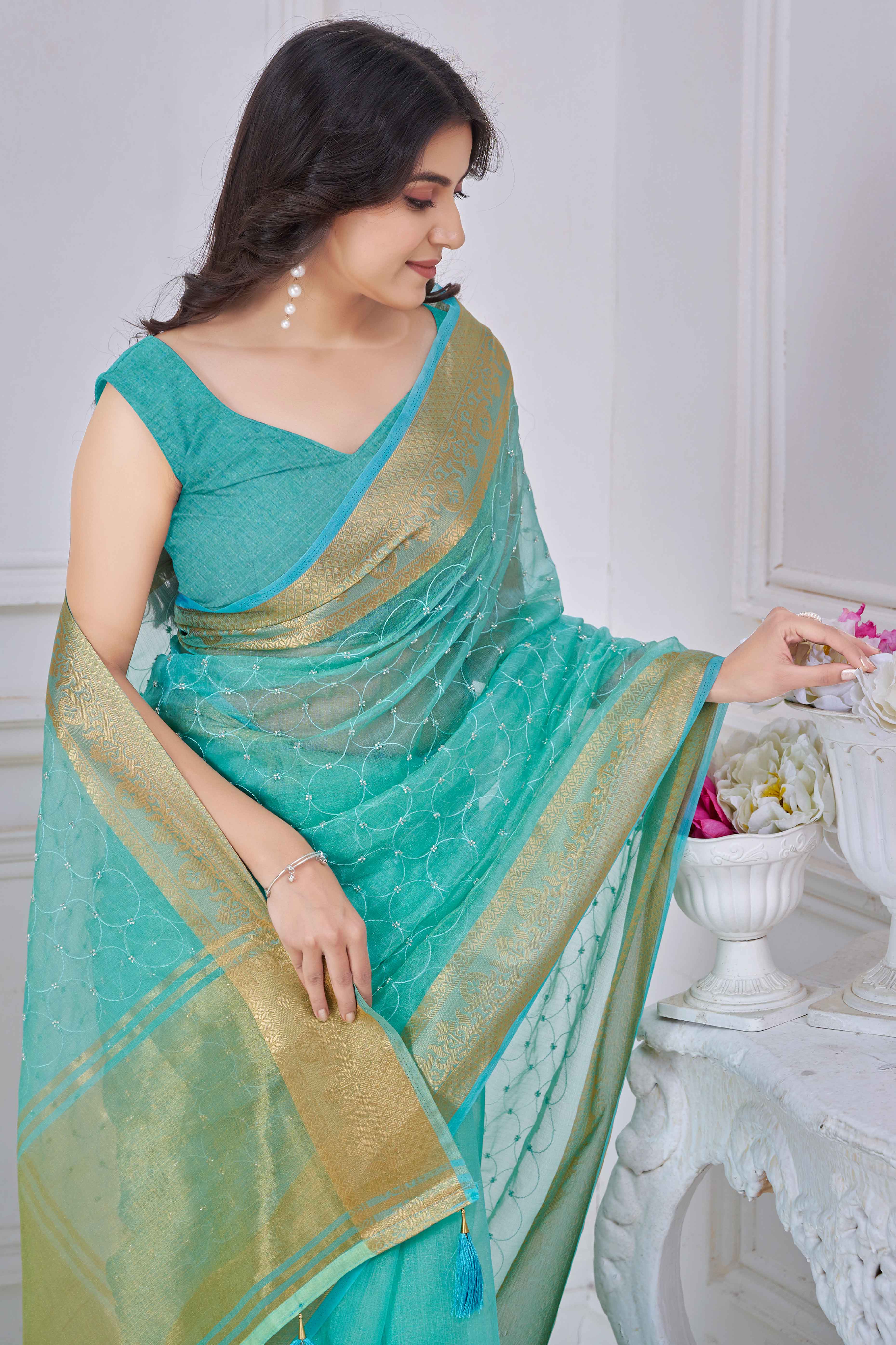 Turquoise Pure Jacquard Saree Weaving with Delicate Beads and Embroidery