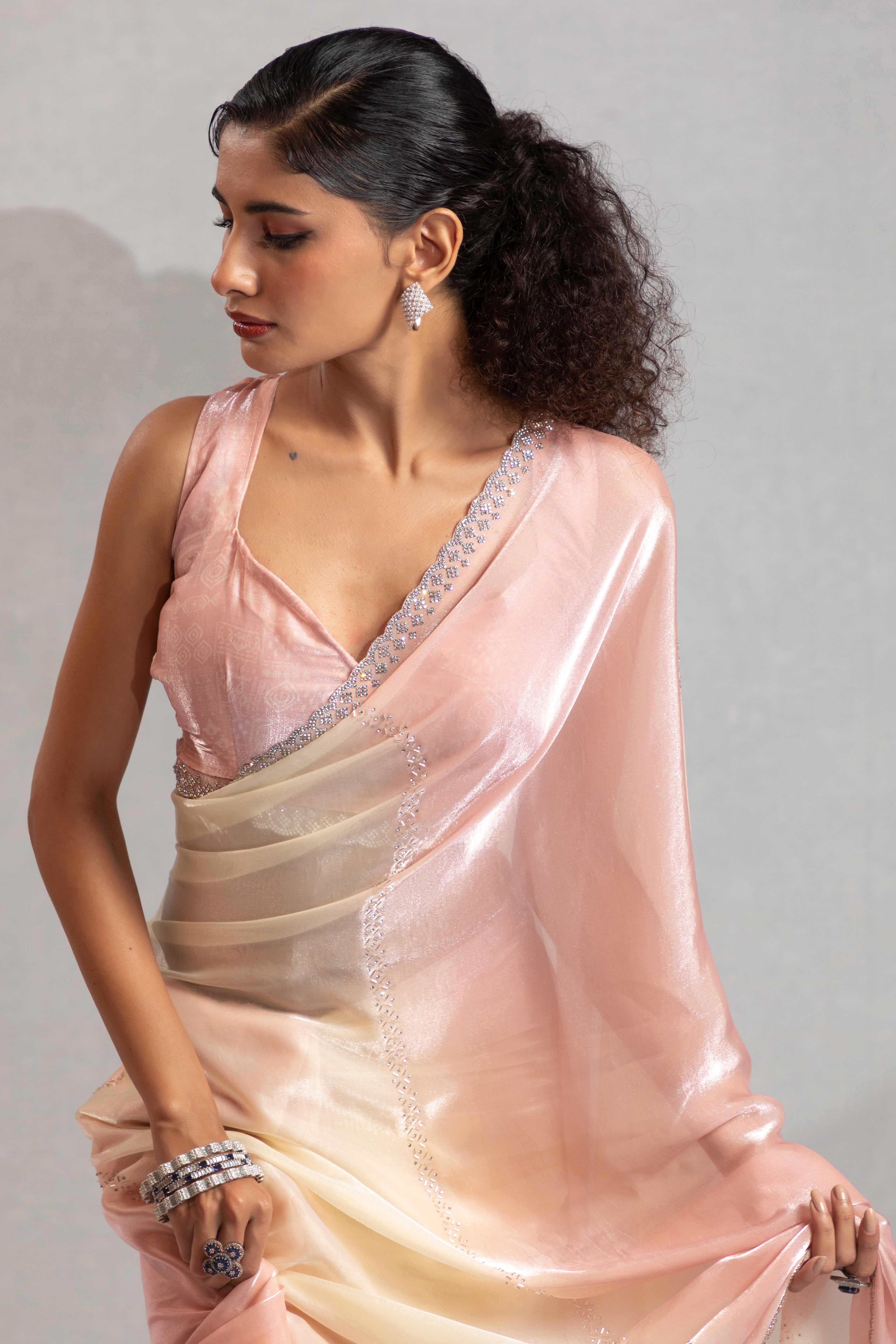 Light Coral & Off White Satin Silk Saree Decorated With Stone Embellishments