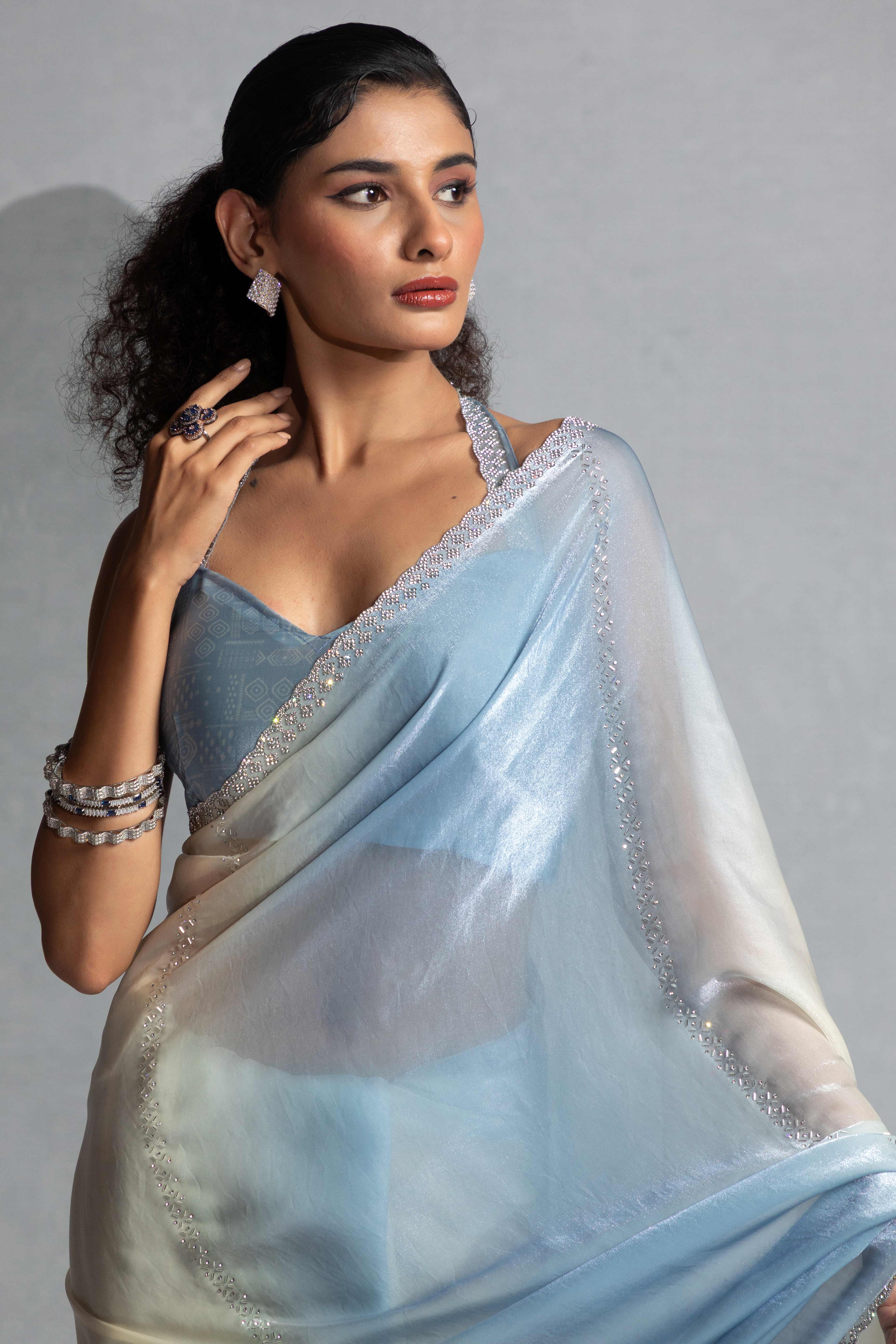 Blue & Off White Satin Silk Saree Decorated With Stone Embellishments