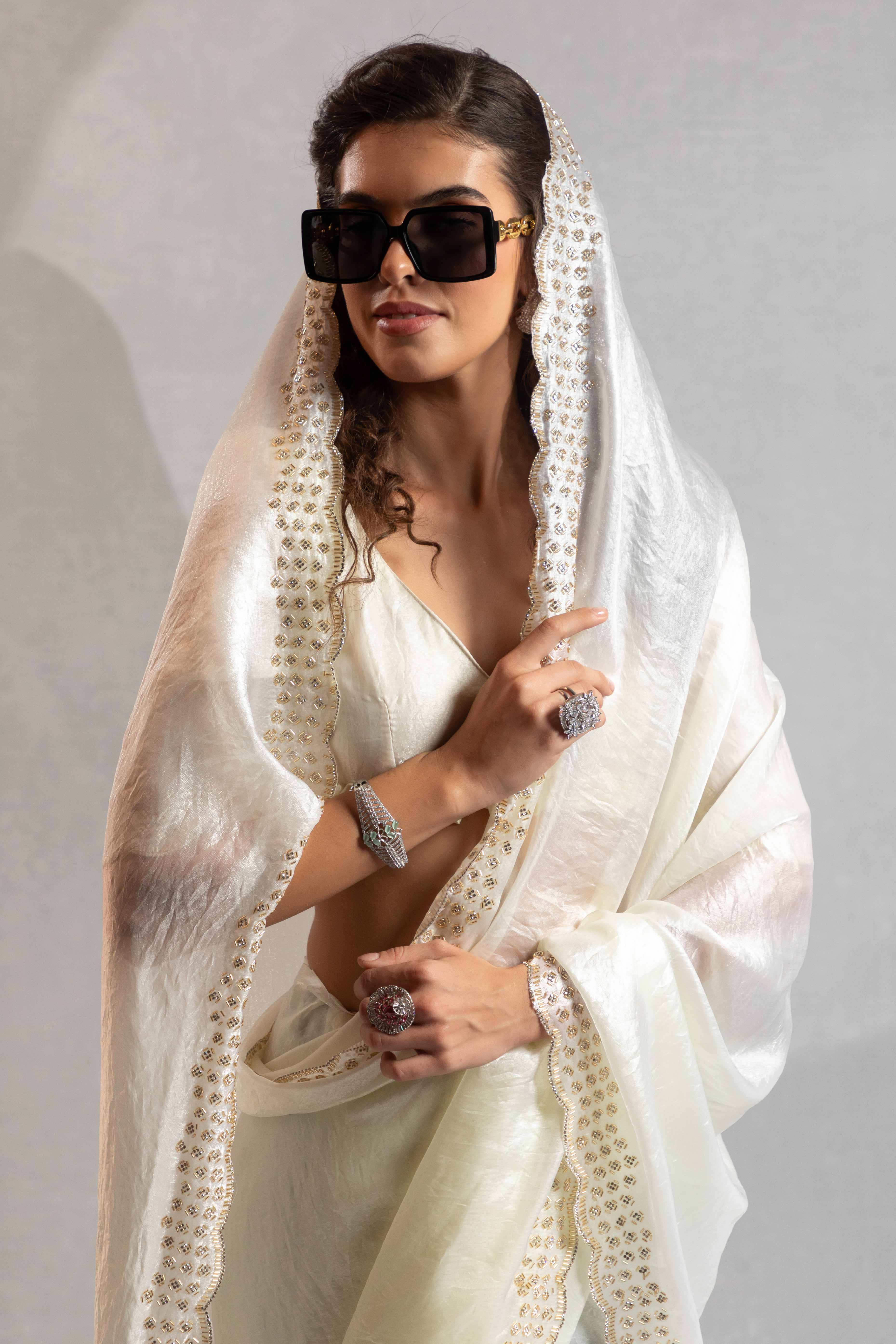 White Satin Saree with Glamorous Stone Embellishment