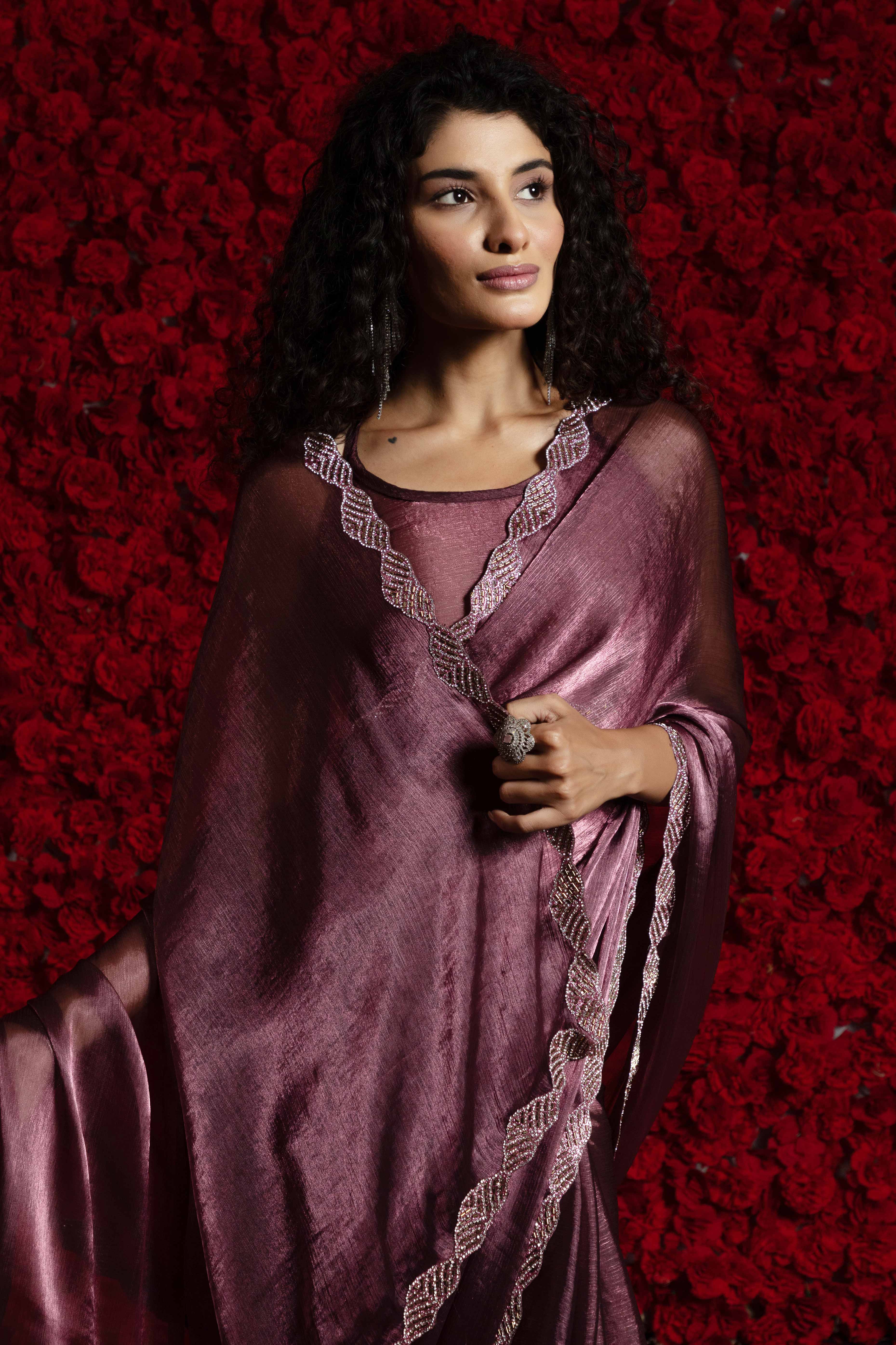 Burgundy Solid Tissue Chiffon Saree Accentuated With A Sparkling Zarkan Work Border